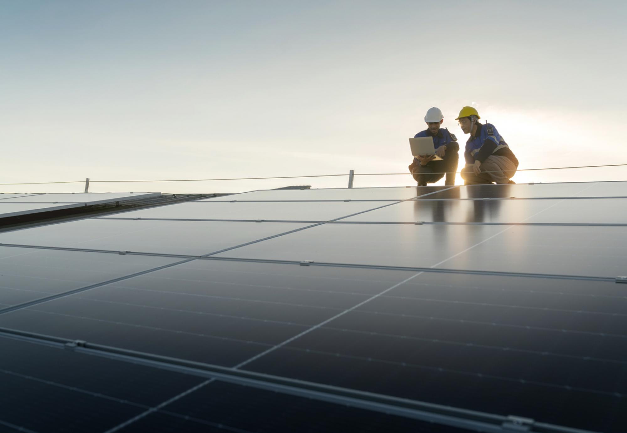 Engineers team survey check solar panel roof