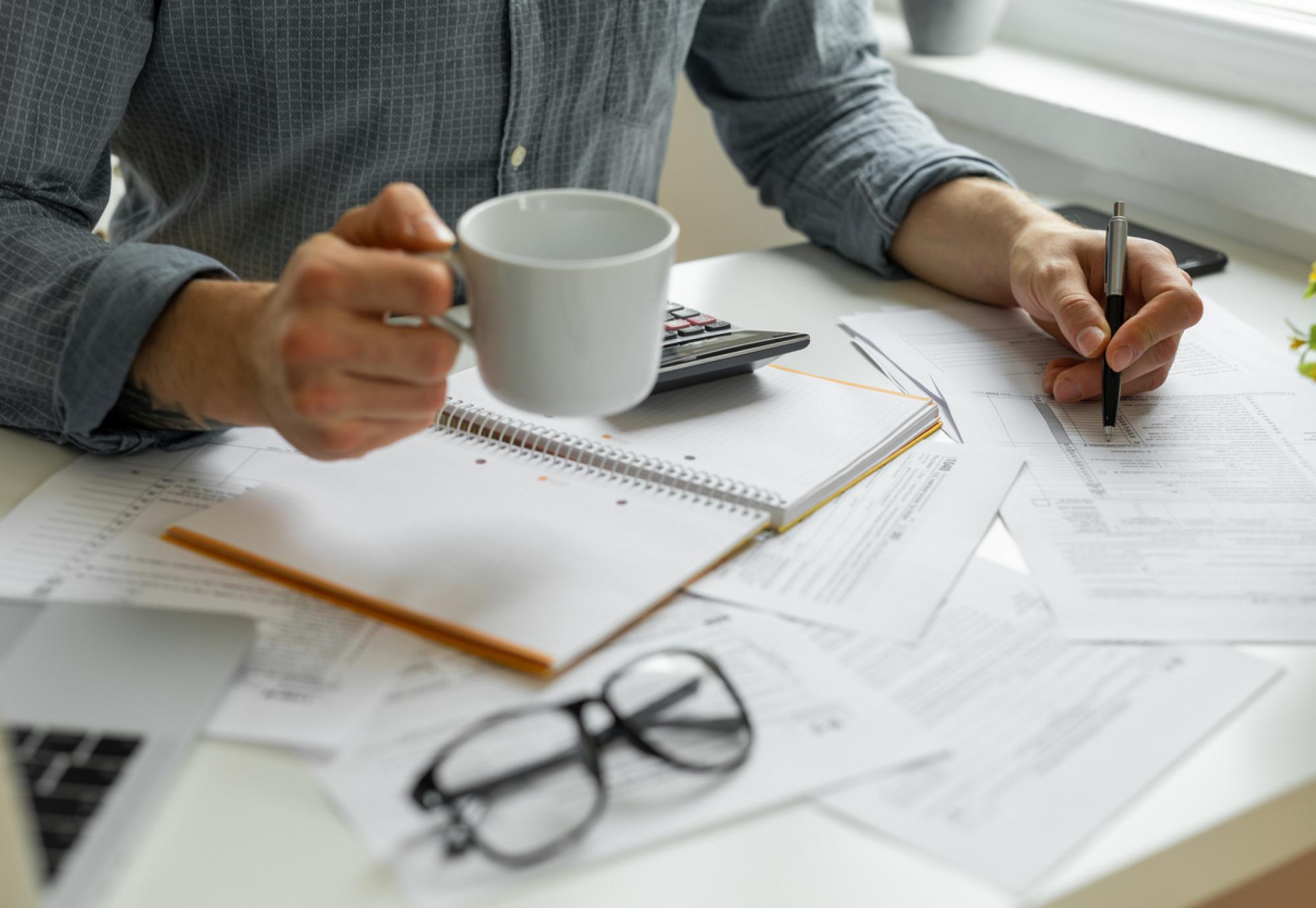 Man doing financial paperwork