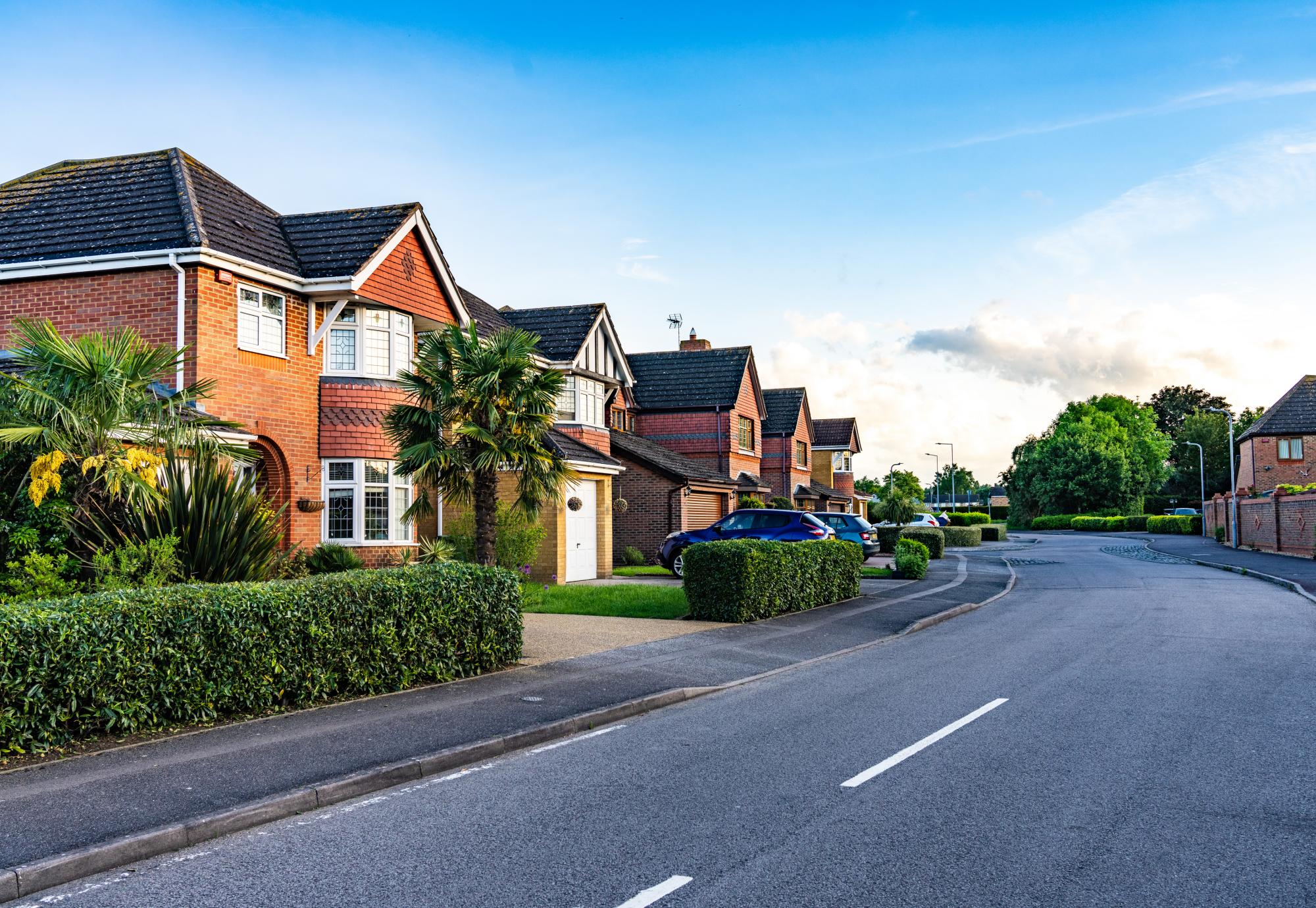 A street on a modern, brick built housing development in the UK