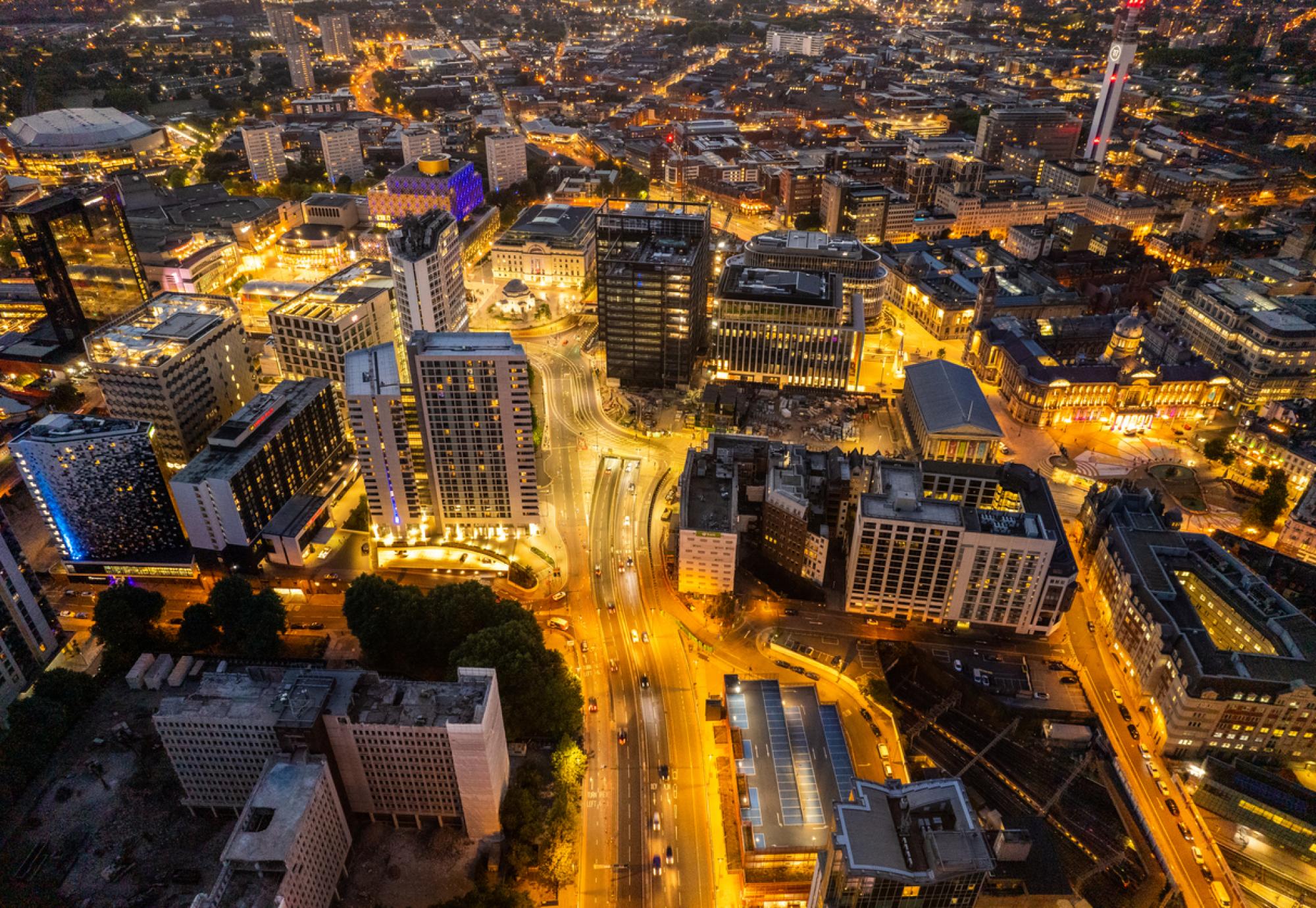 Aerial view over Birmingham city centre by night