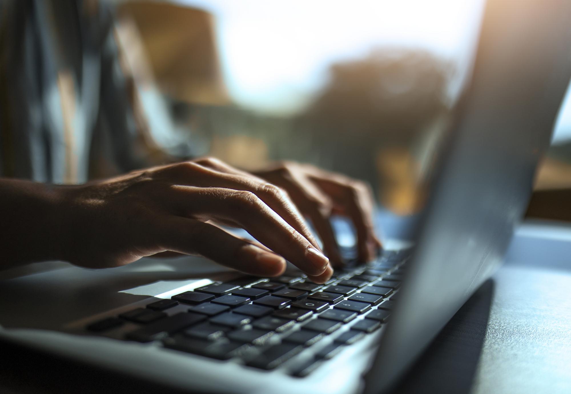 Close up of a hands on a keyboard