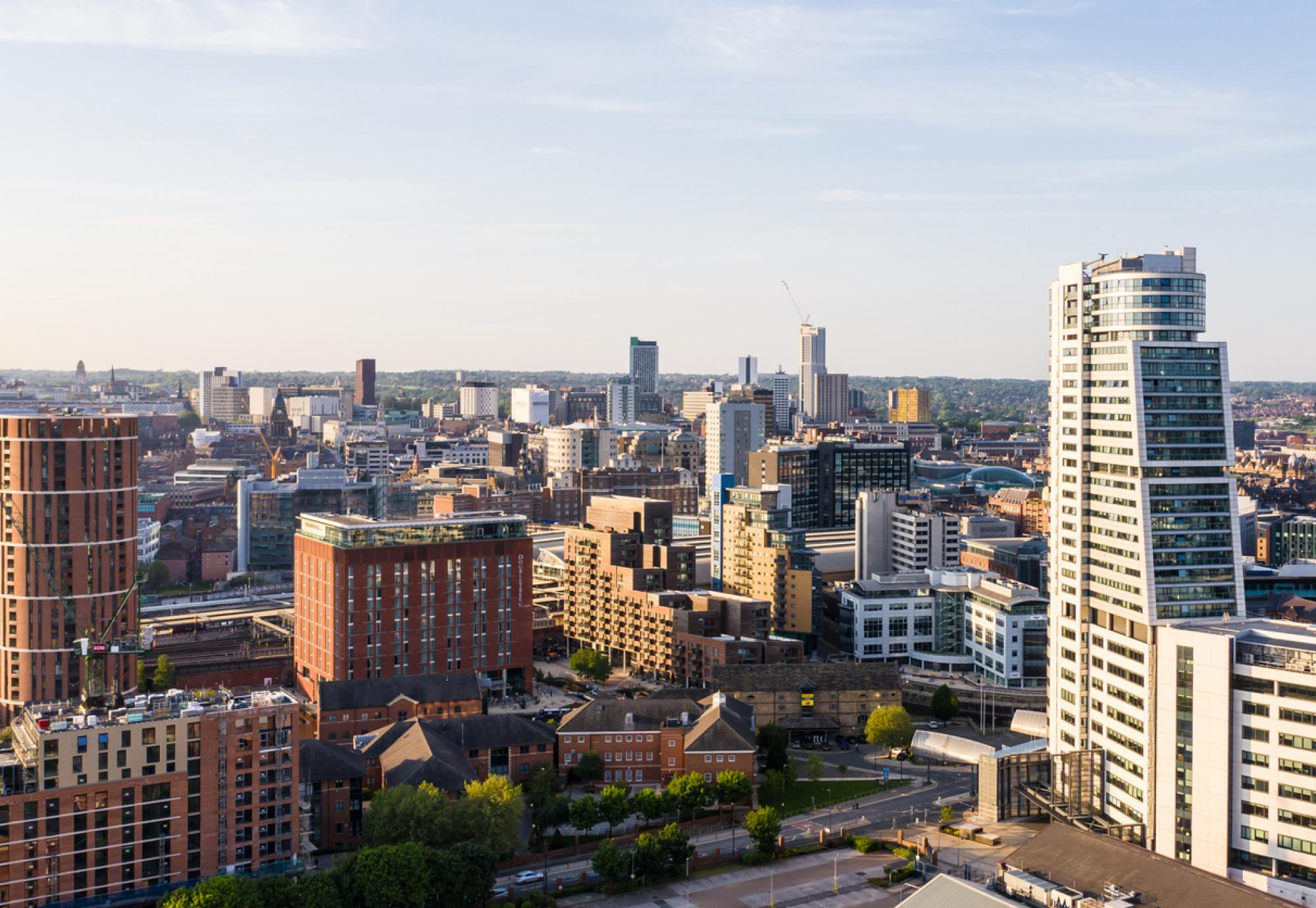 Aerial view of Leeds city centre skyline in West Yorkshire at sunset