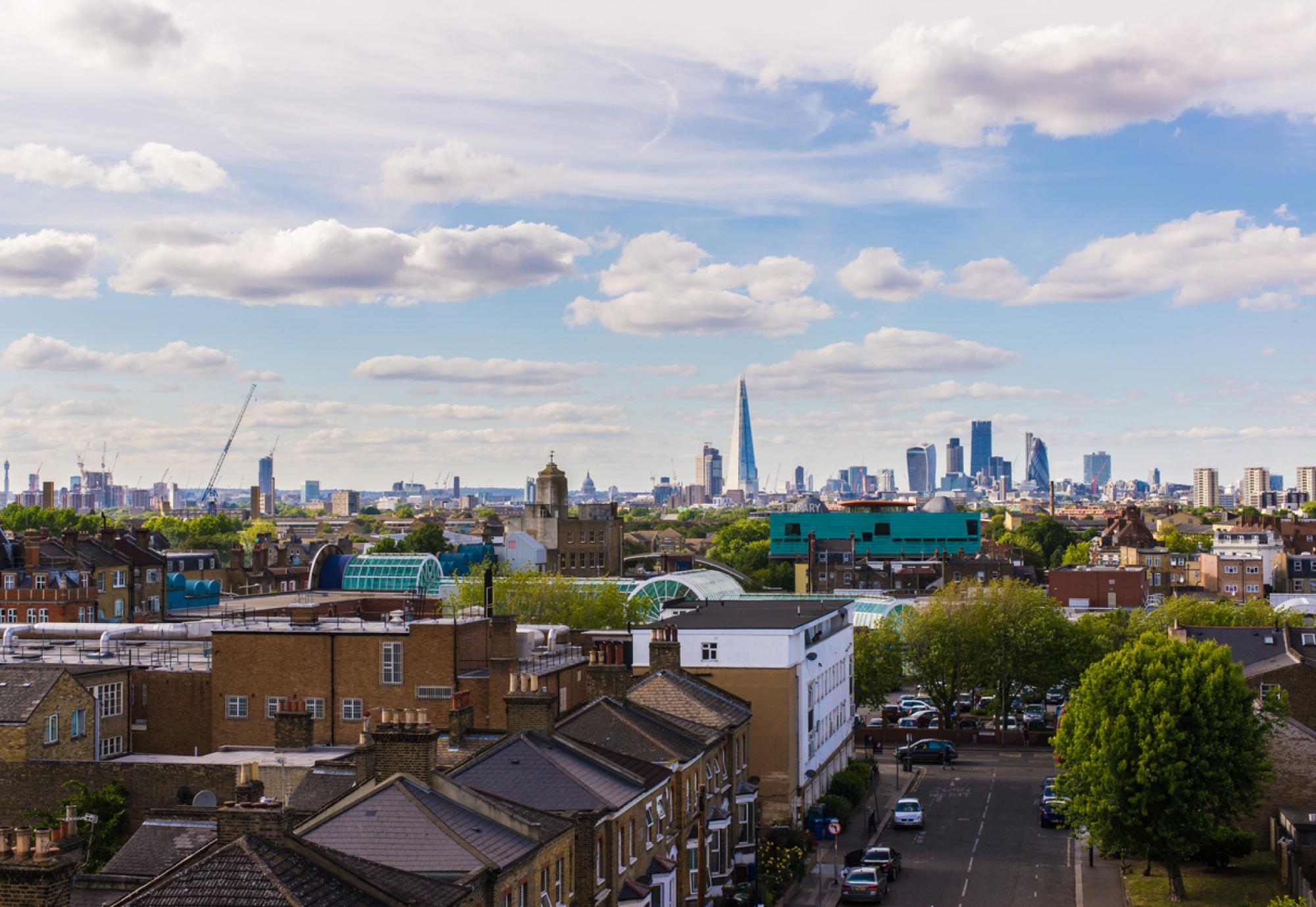 Residential area with flats in south London with a view of the city of London and its most iconic skyscrapers