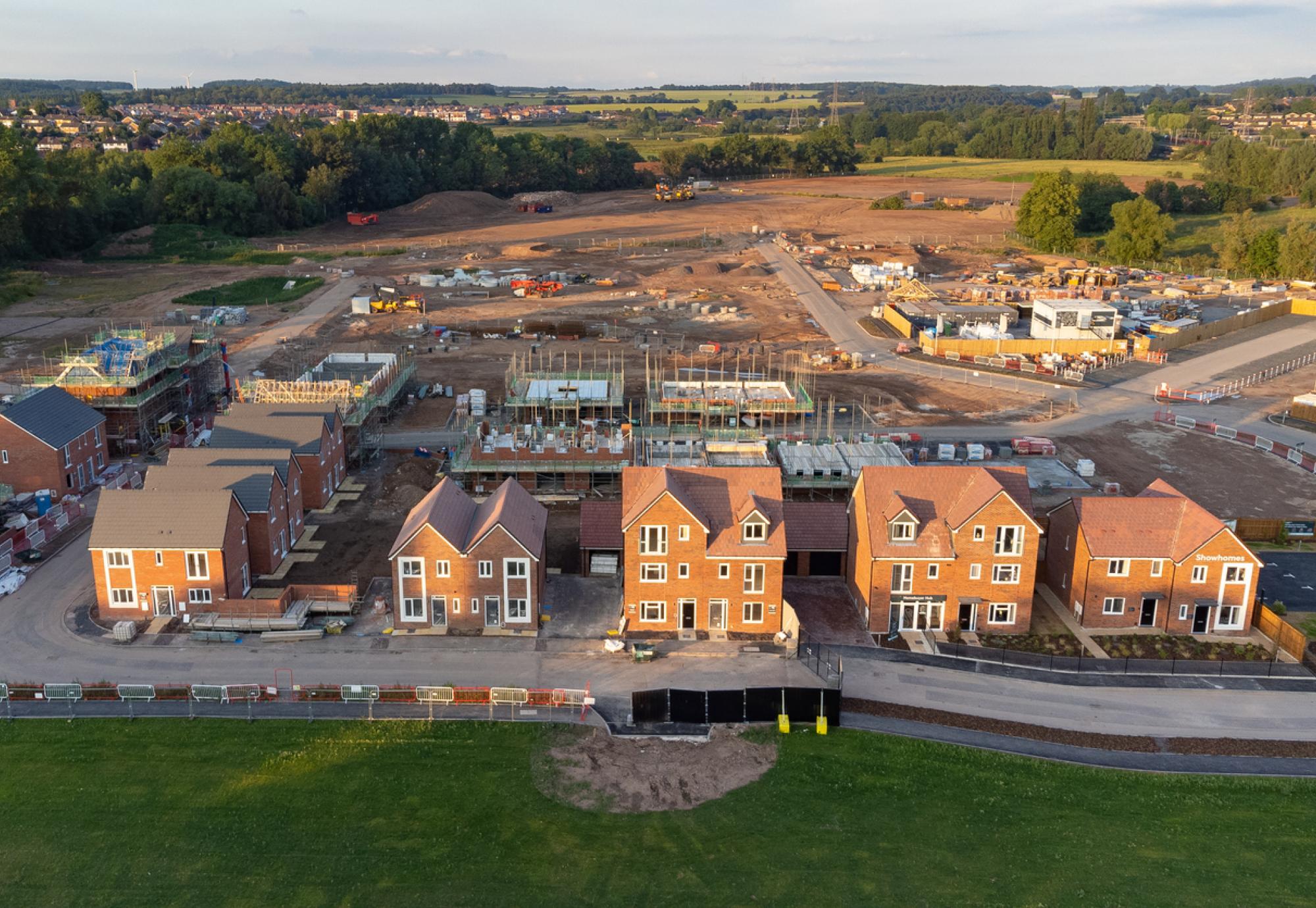 Aerial view looking down on new build housing construction site in England, UK