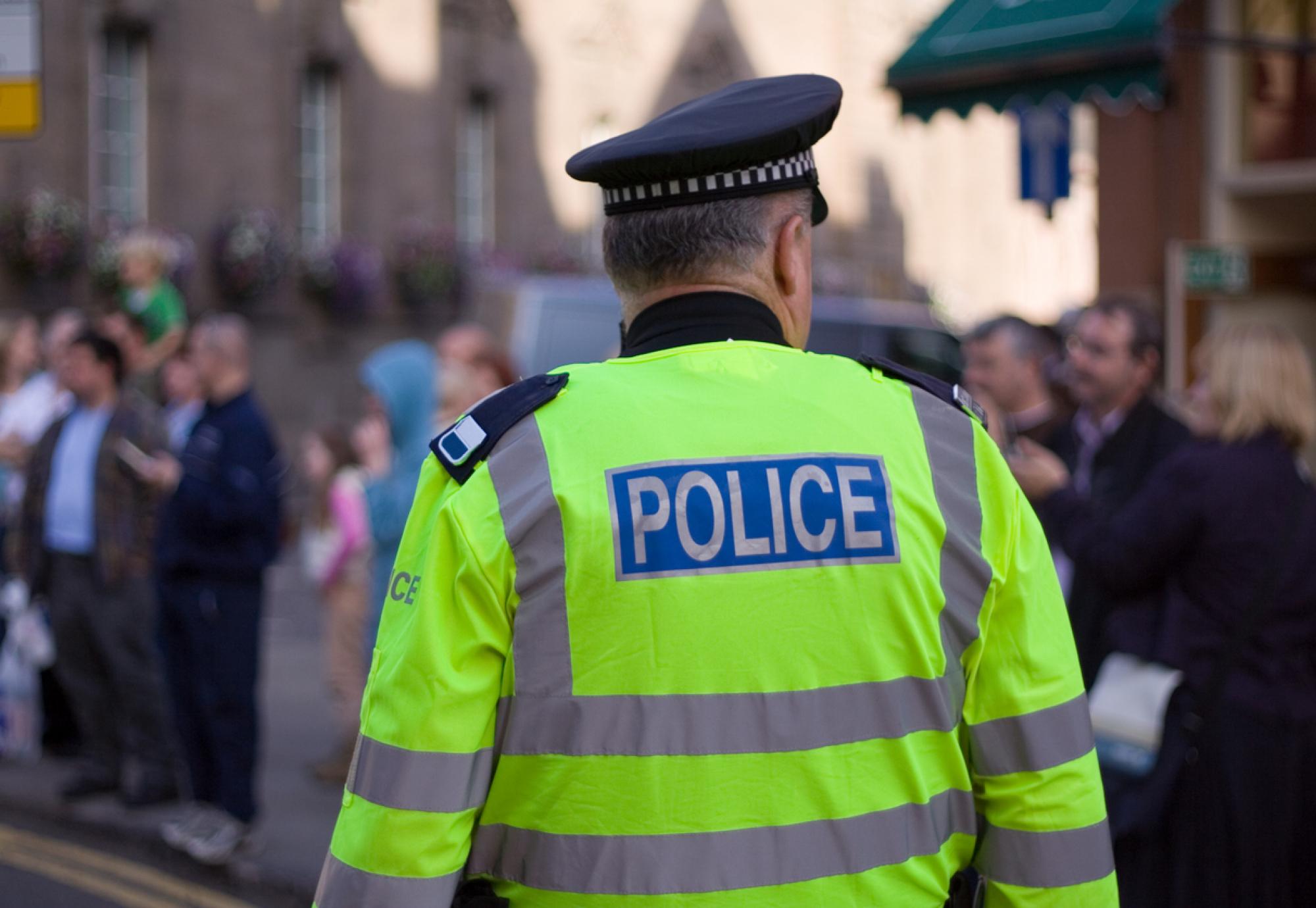 police at crowded street