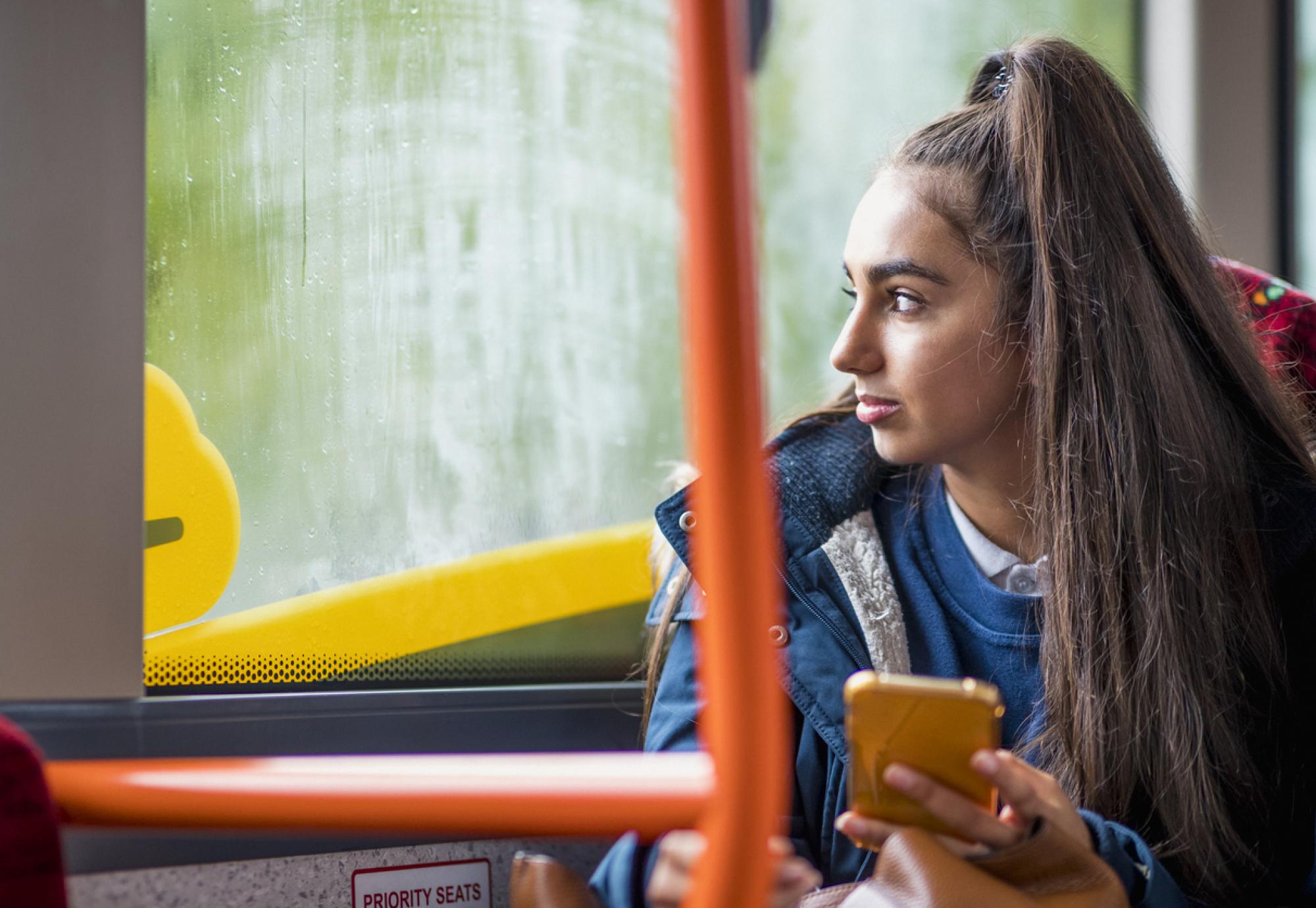 teenage girl commuting to school