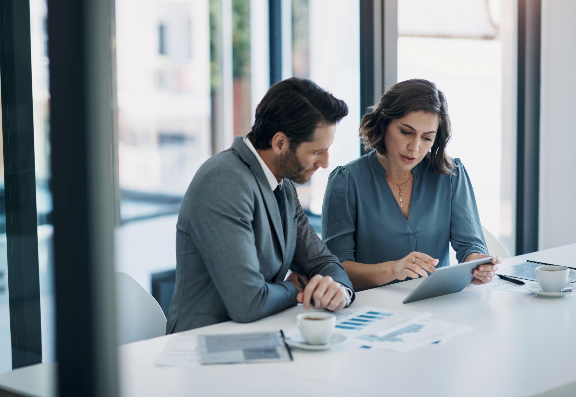 Two people in a business meeting