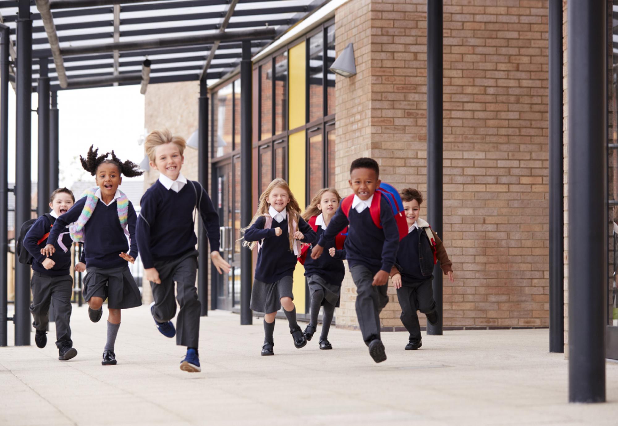 Children running in a school