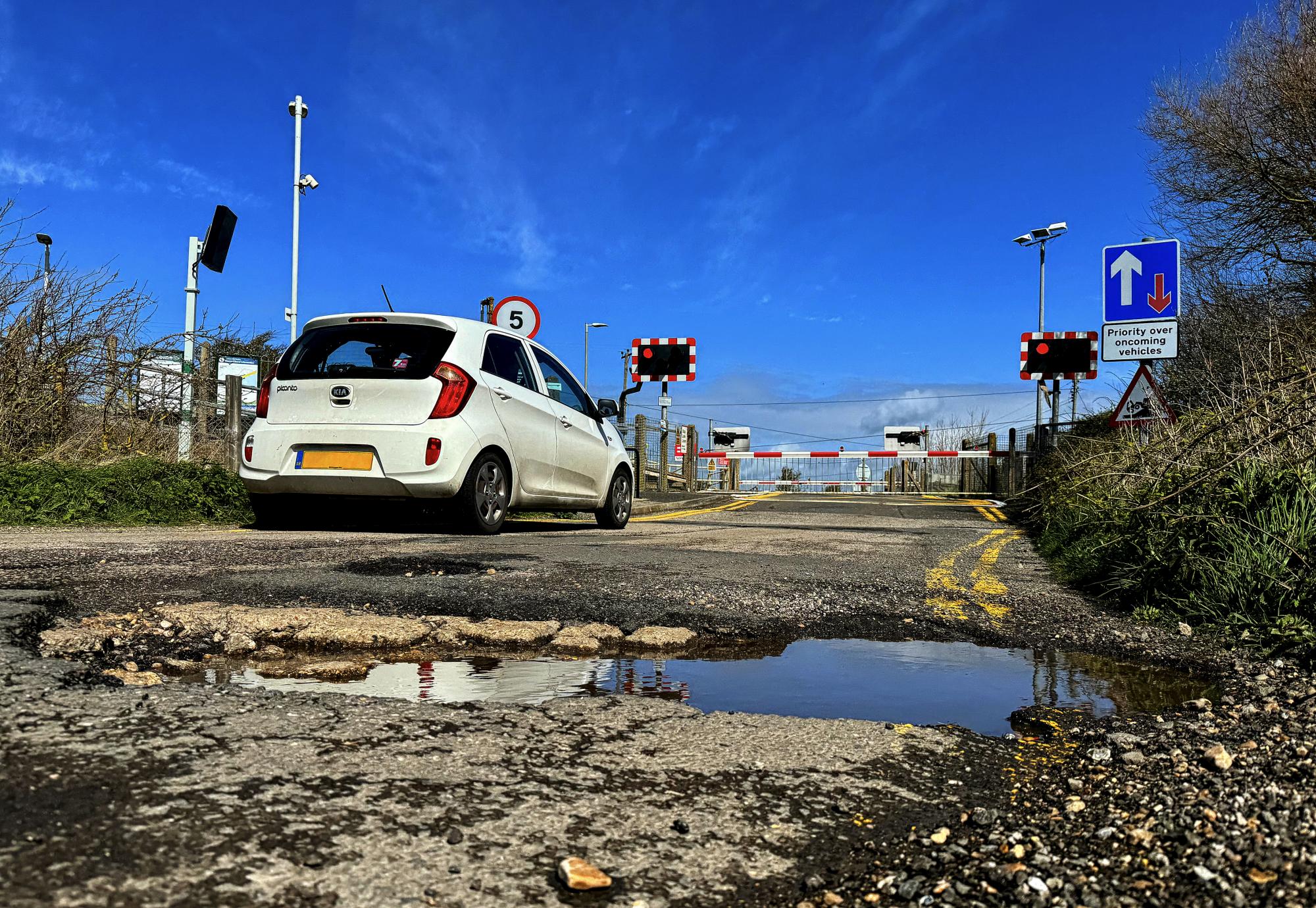 Water-filled potholes in the road