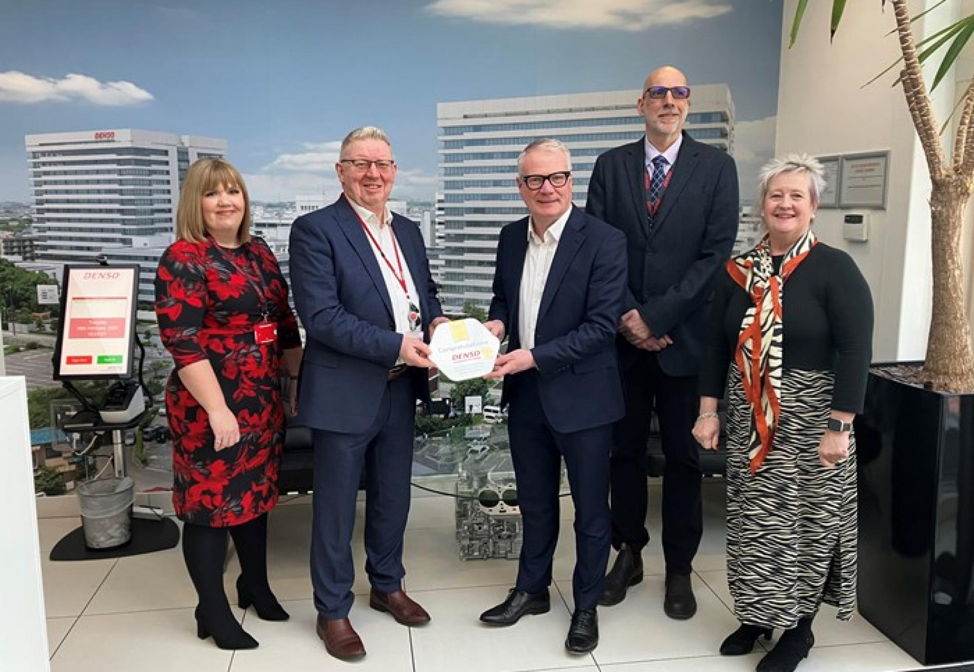 Mayor with staff about the scheme