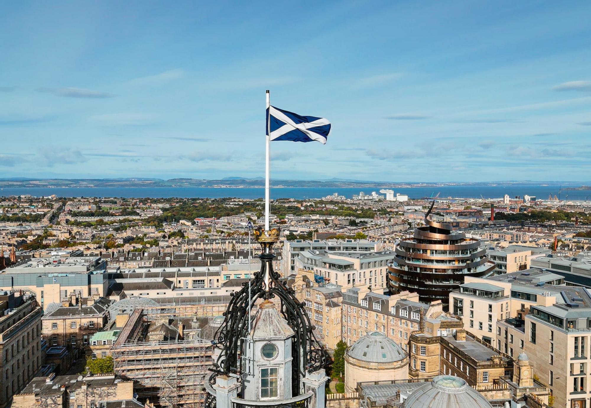 Scottish flag above Edinburgh