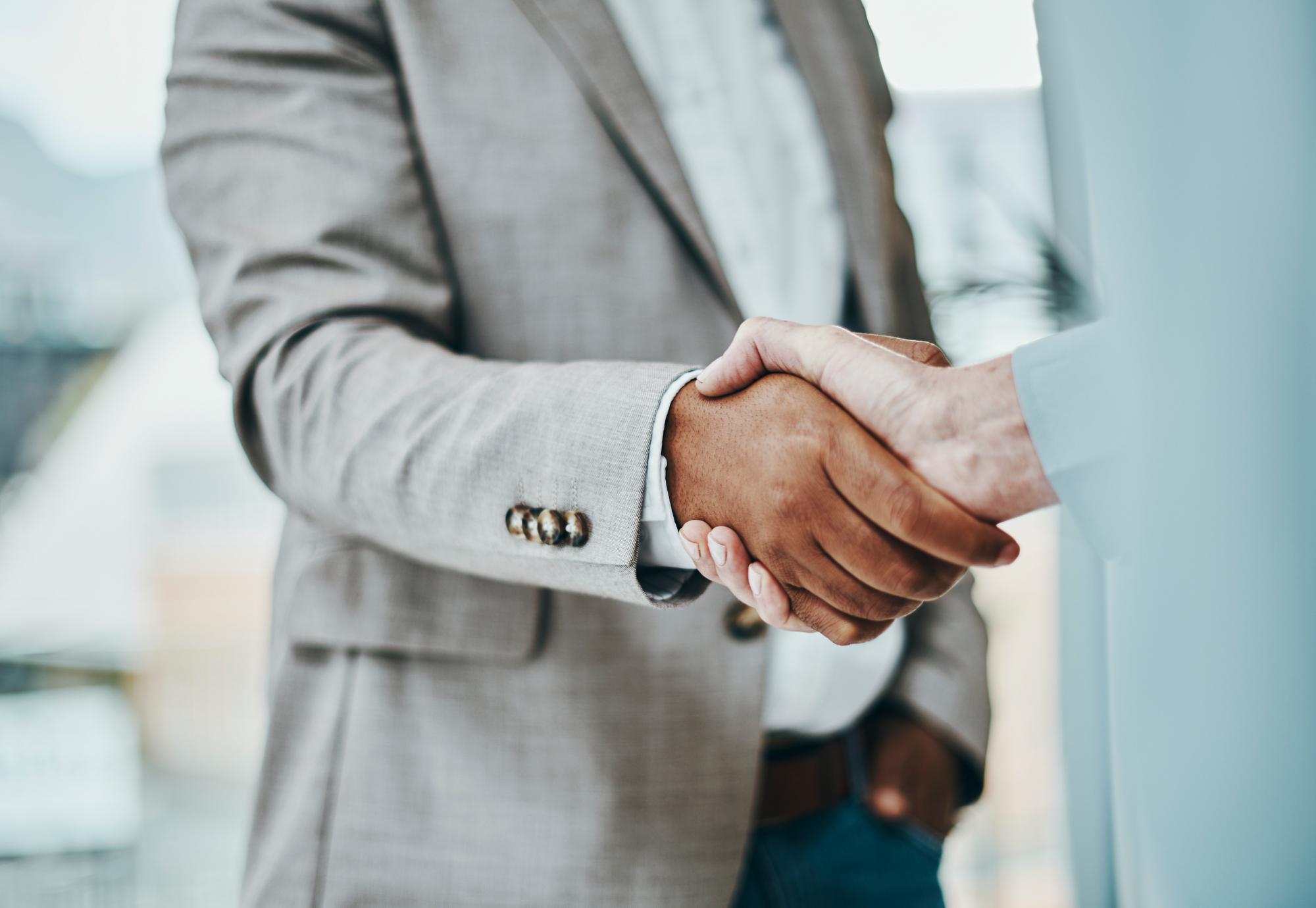 Two people shaking hands