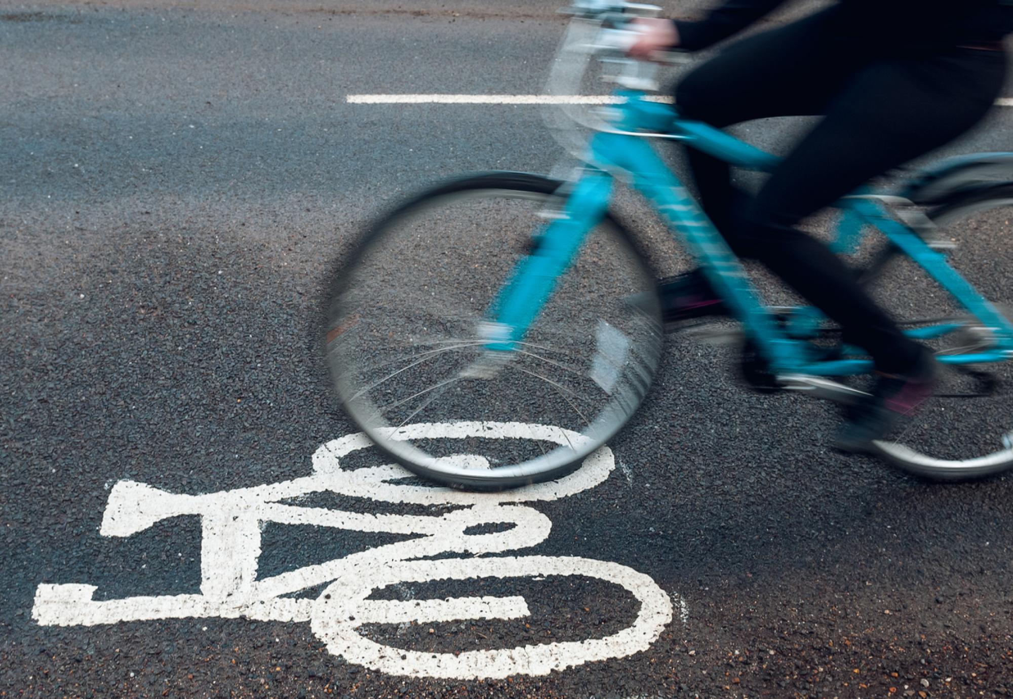 Person riding in cycling lane