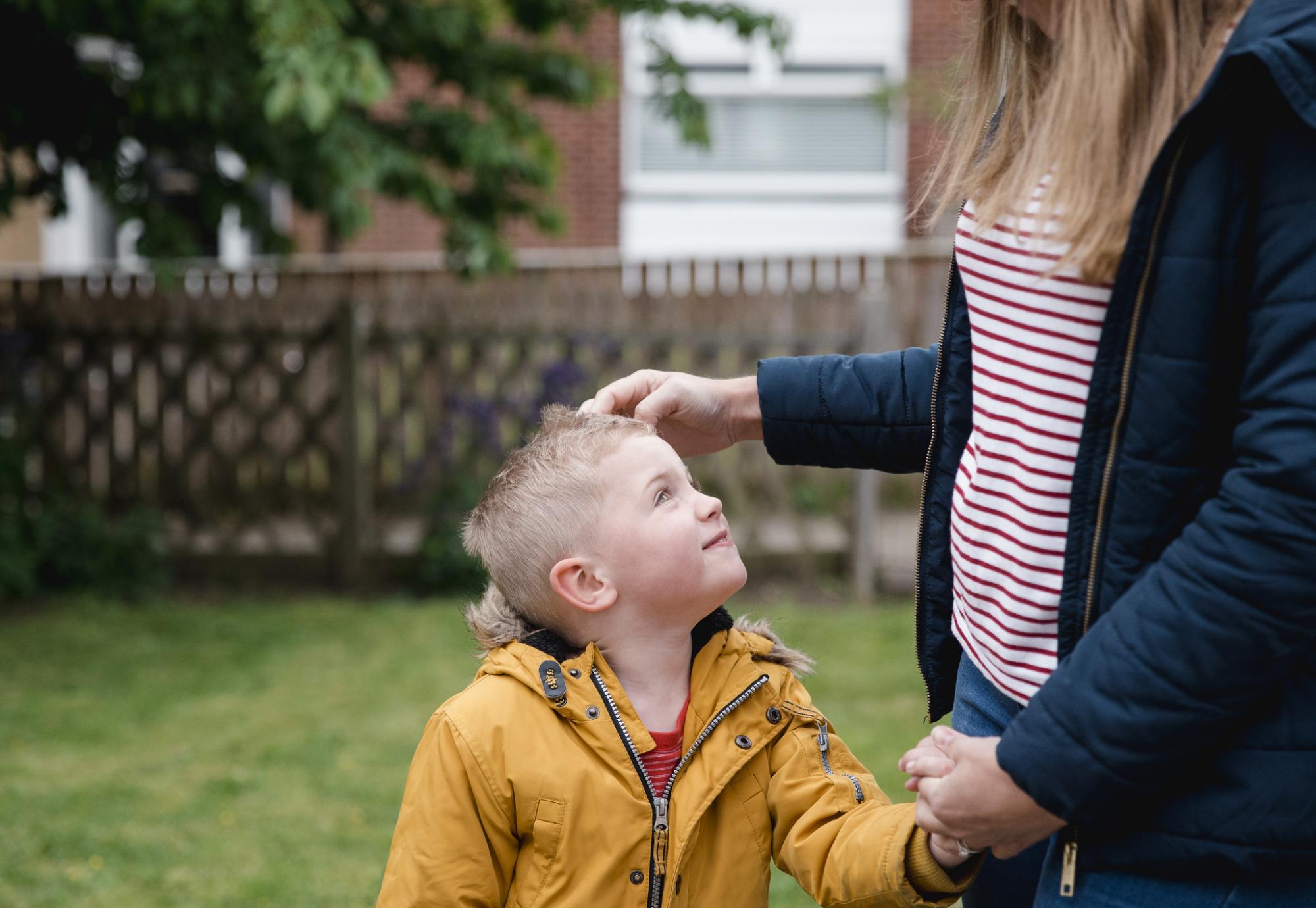 Little boy smiling at his mum
