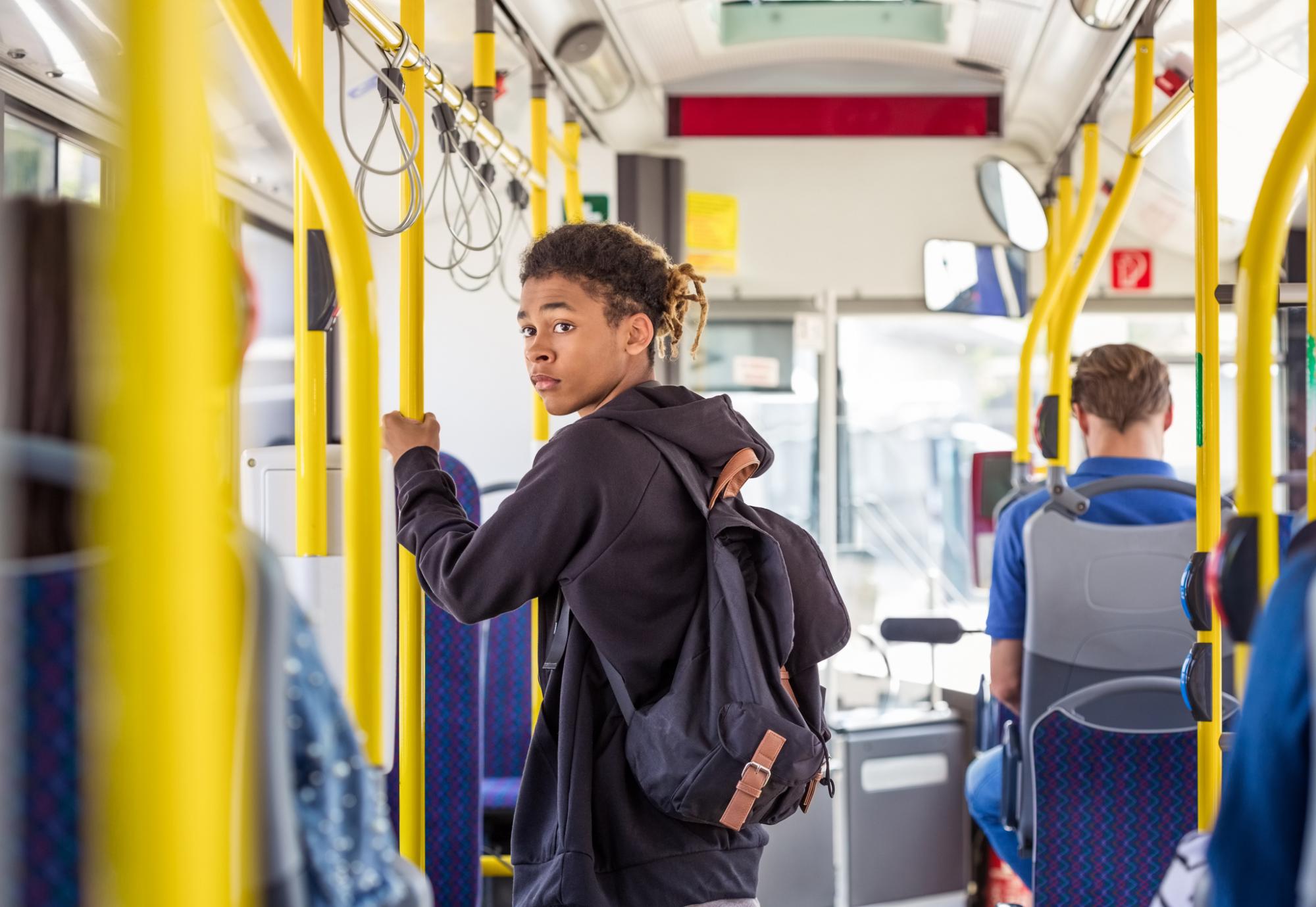 Teenage boy on a bus