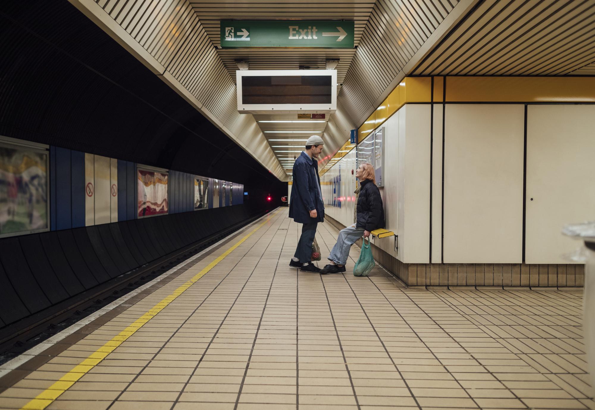 Two people on metro platform