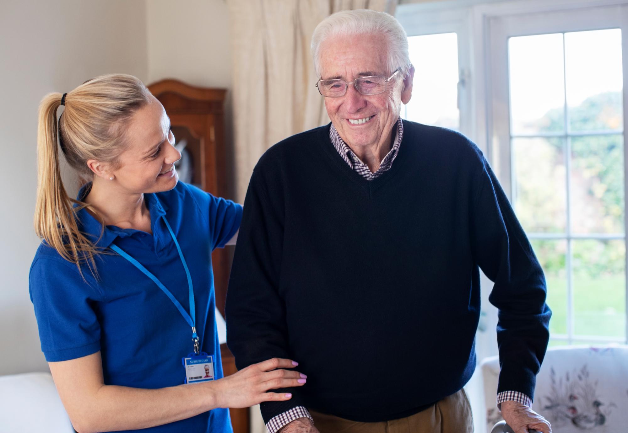 Carer with an elderly gentleman