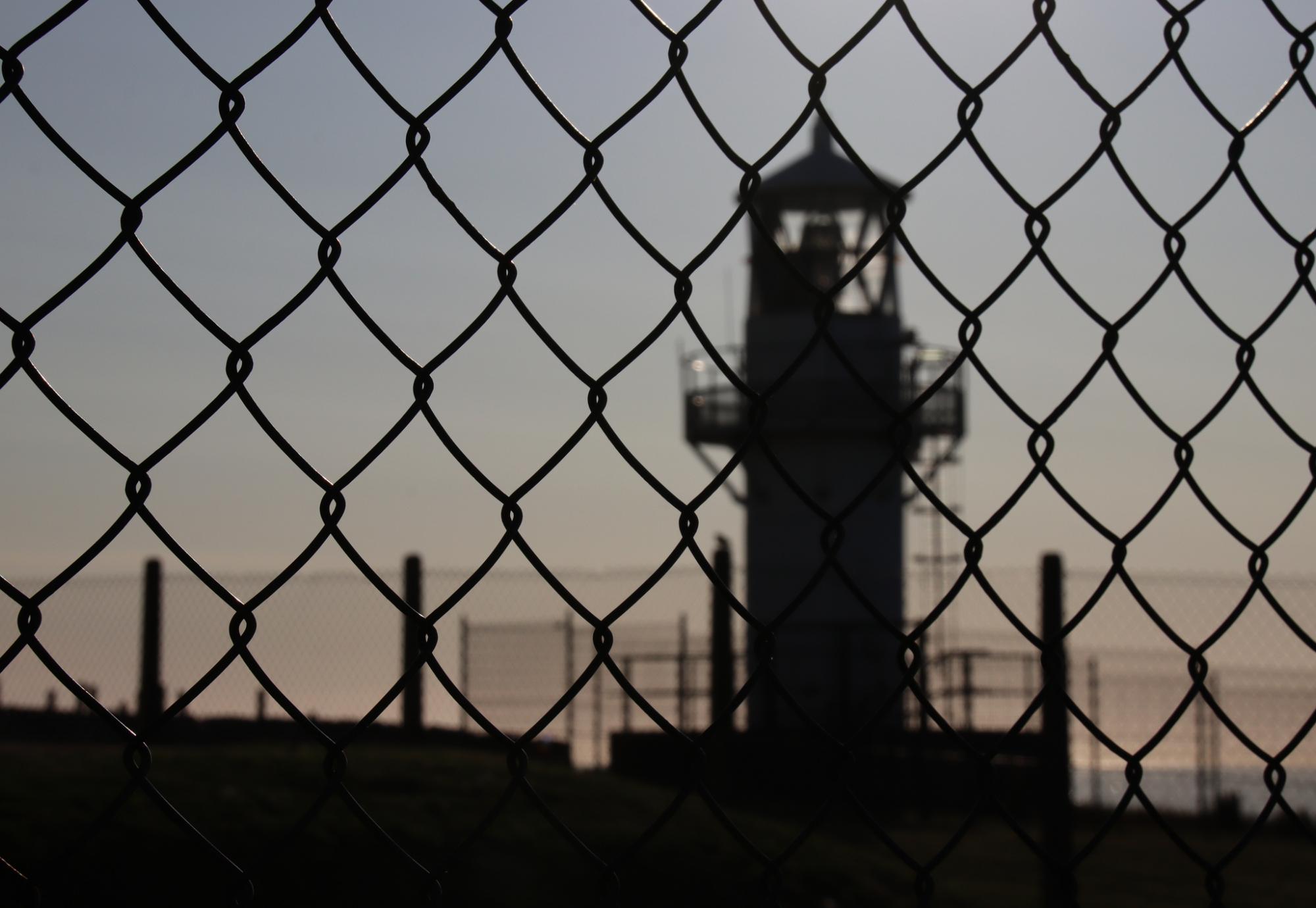 Prison fence and tower