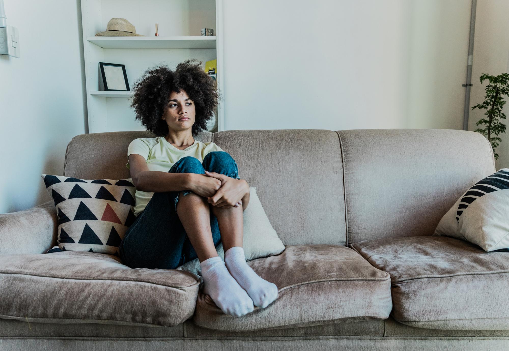 Young person sat at home