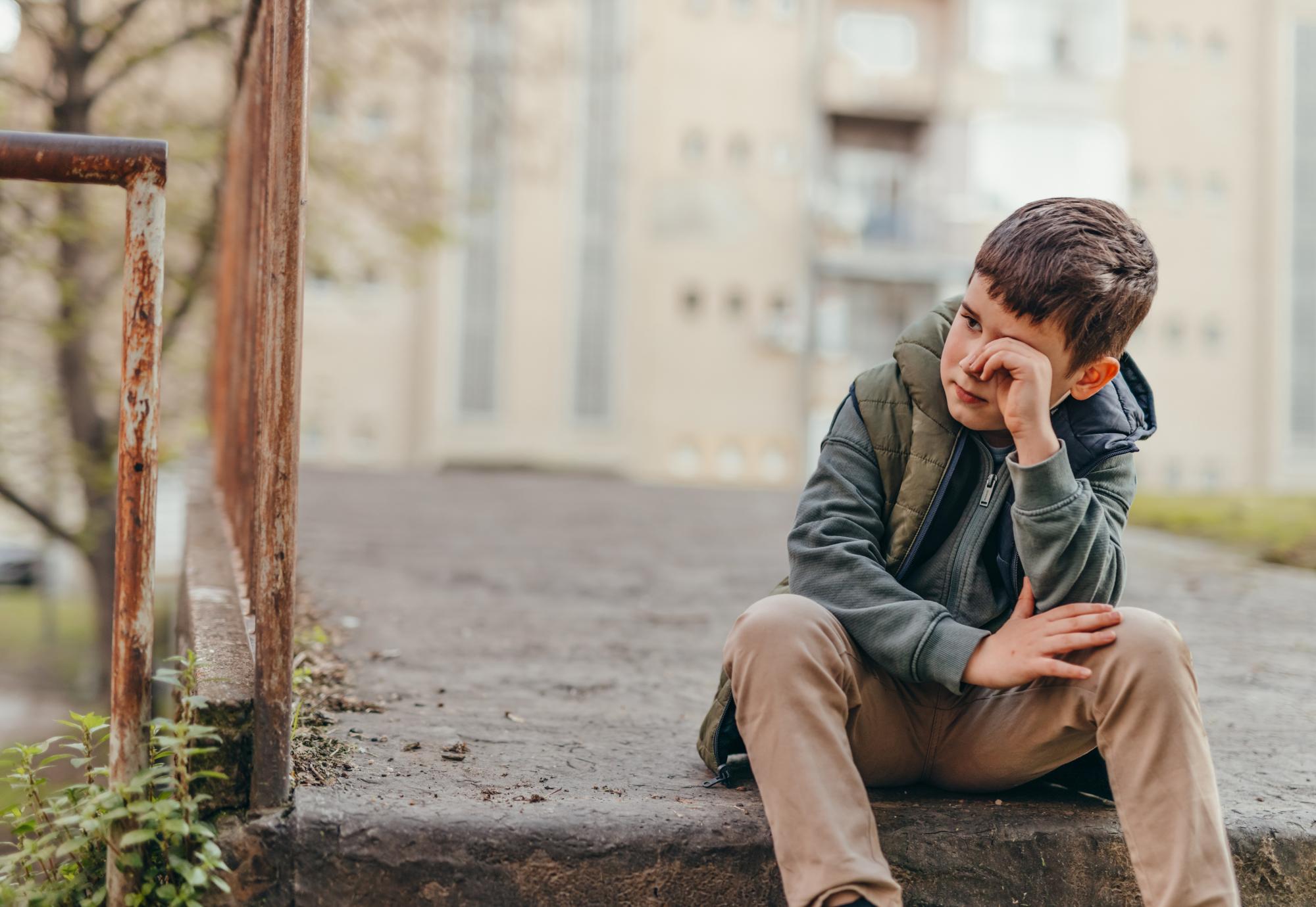 Sad poor child