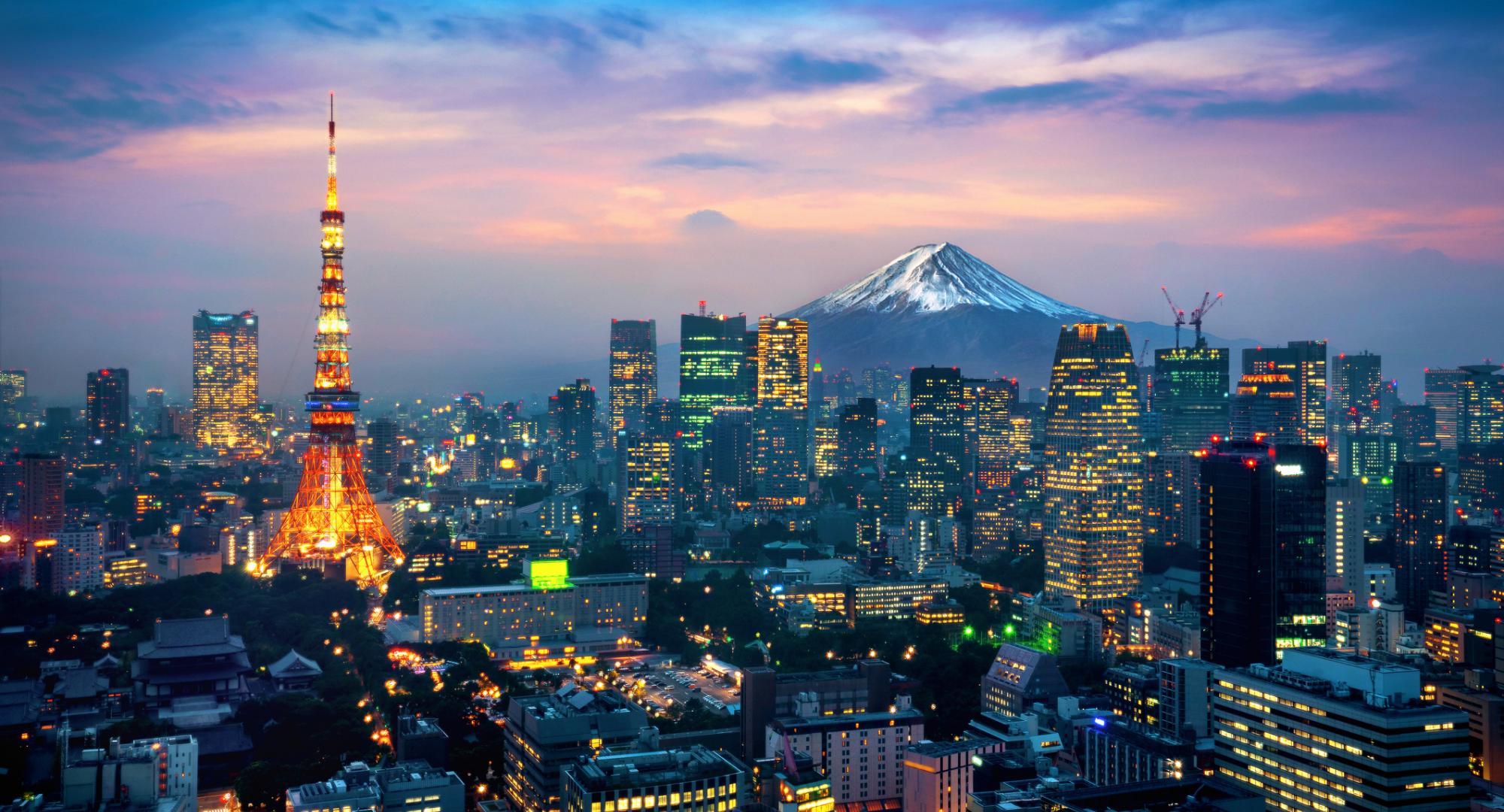 Picture of Japanese cityscape with Mt Fuji in background.