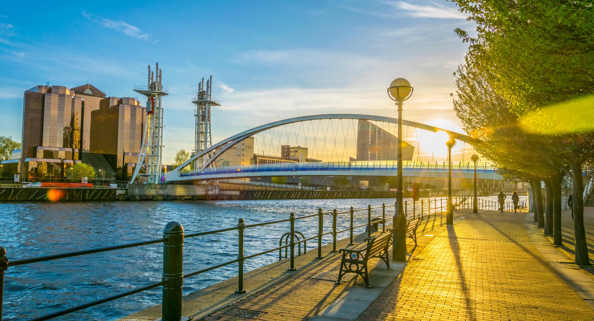 A picture of Salford Quays taken during golden hour.