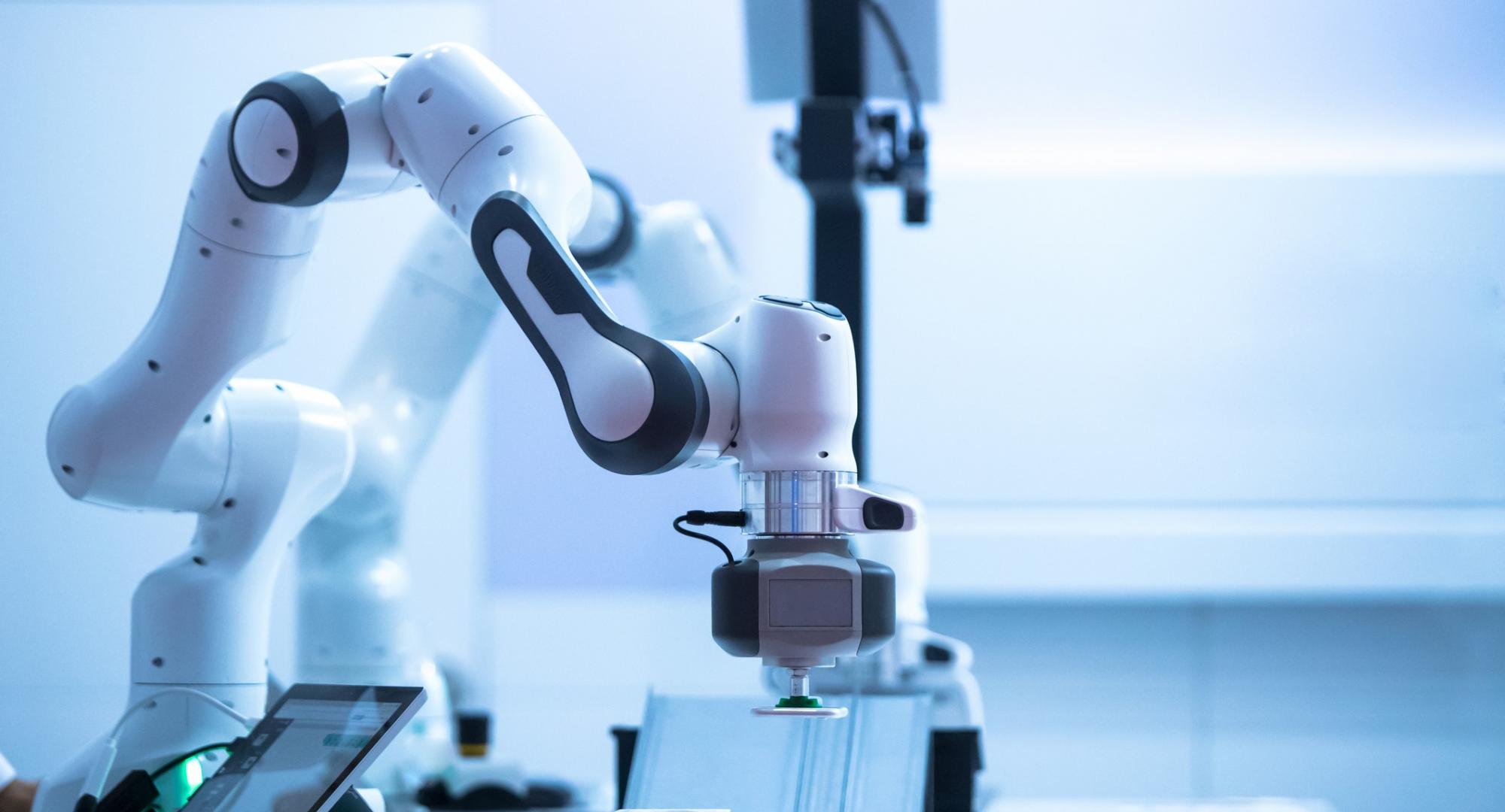 Robot arm working at a factory