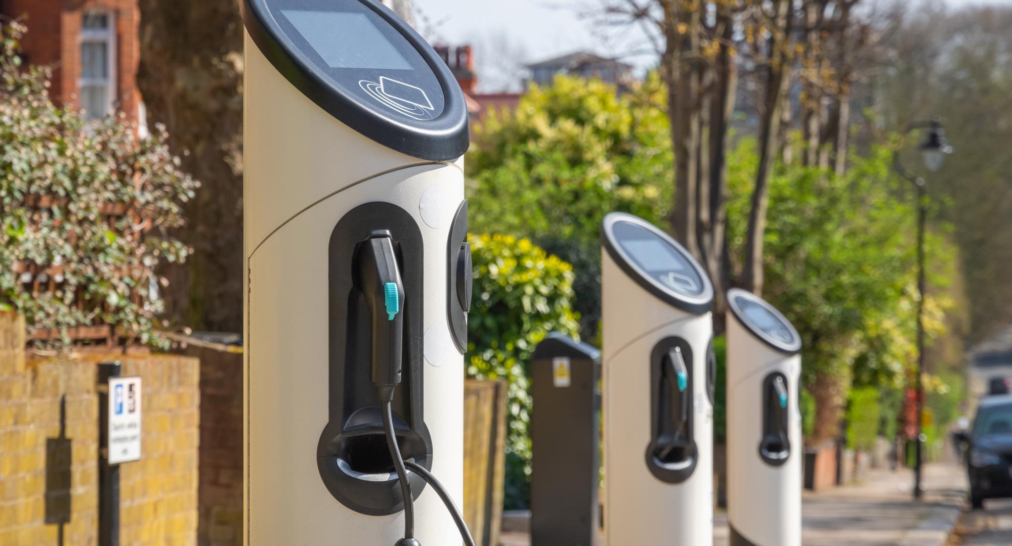 Electric vehicle charging points in the street. 