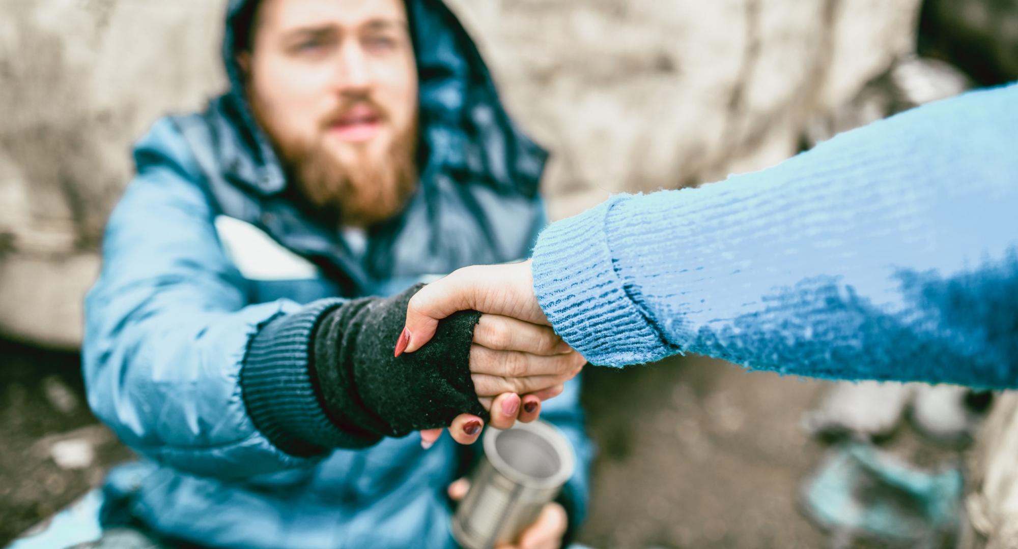 Homeless man helped off the street