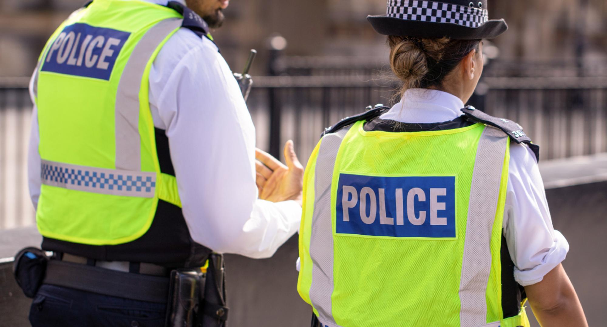 Two UK police officers on duty