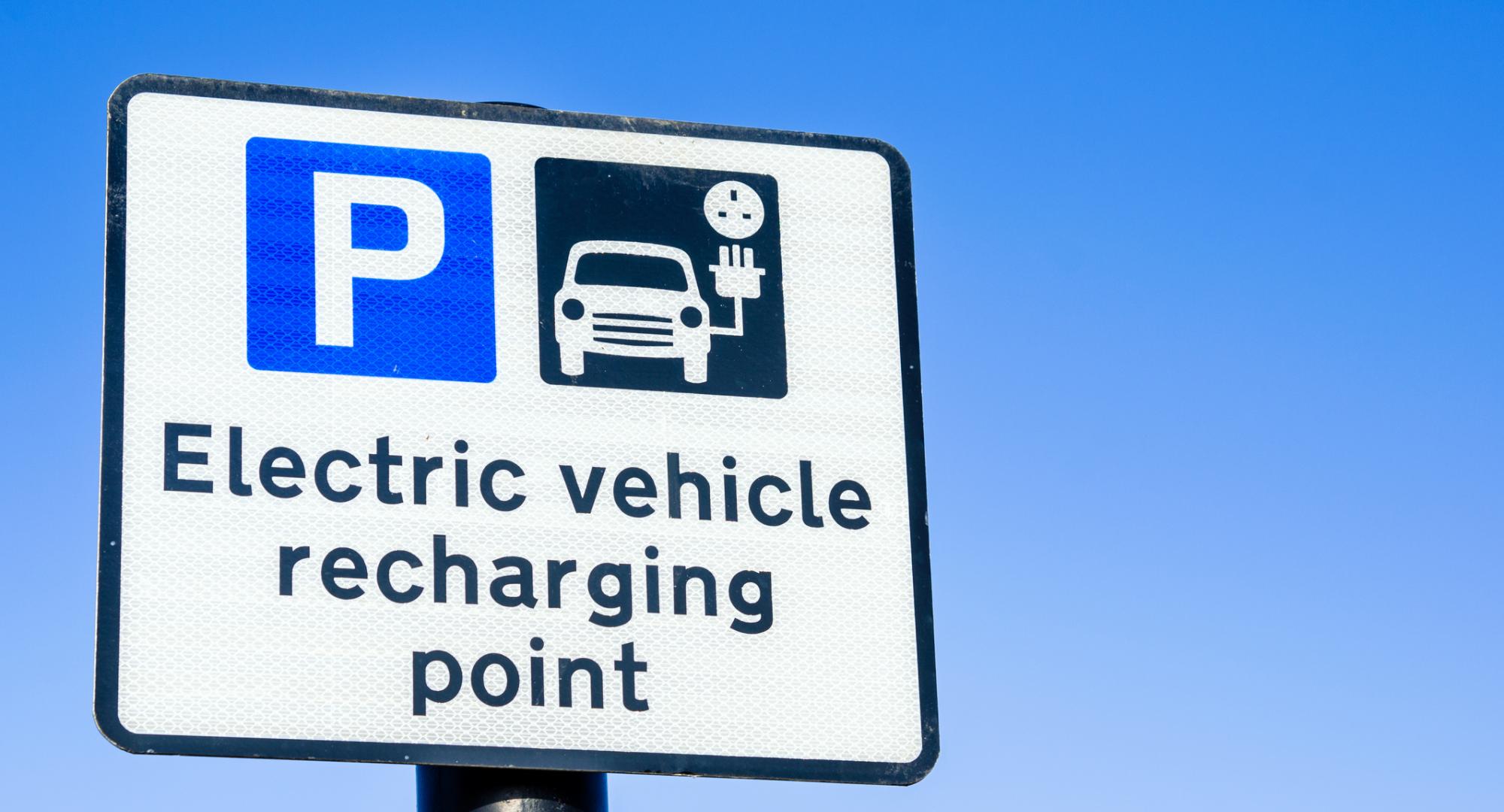 Electric vehicle charging sign
