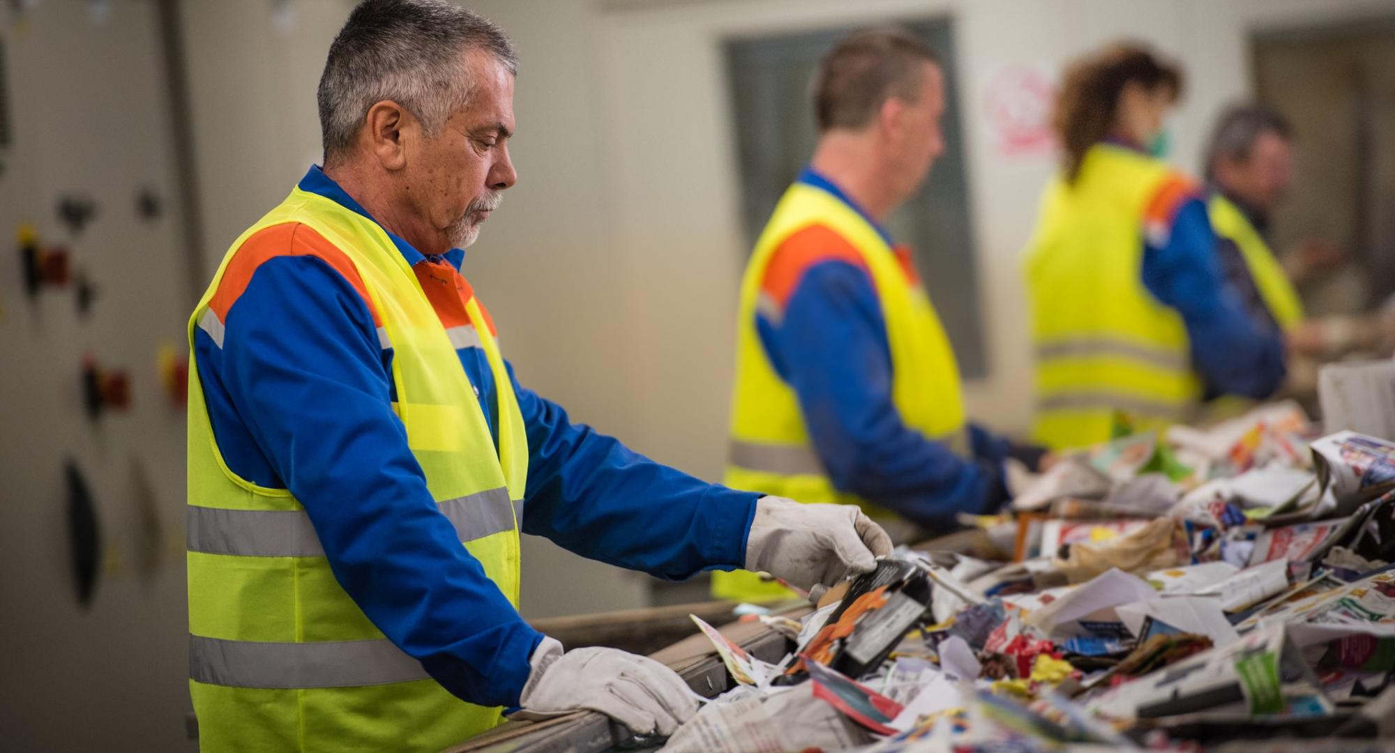 Waste recycling worker