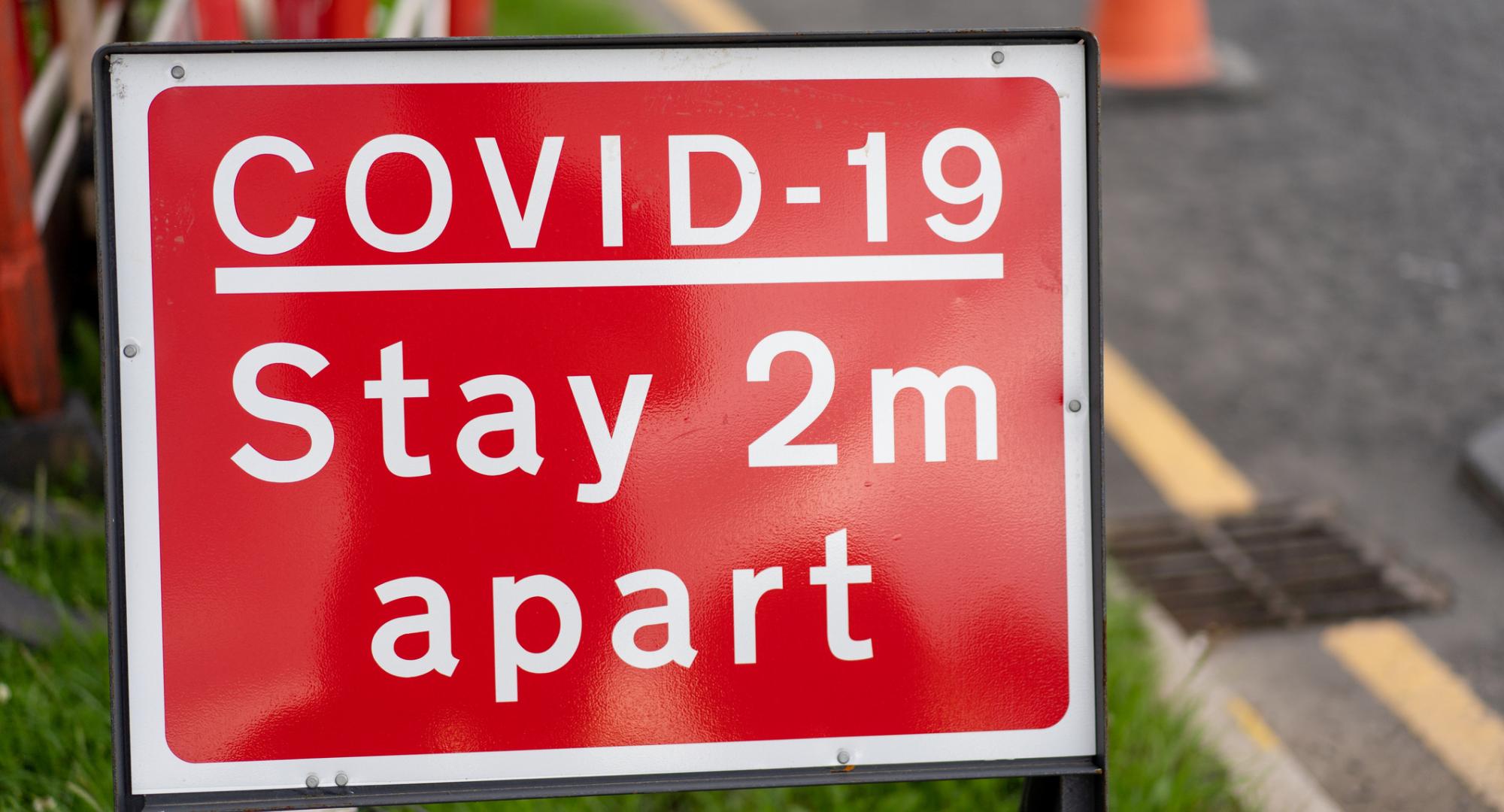 Covid-19 restrictions sign