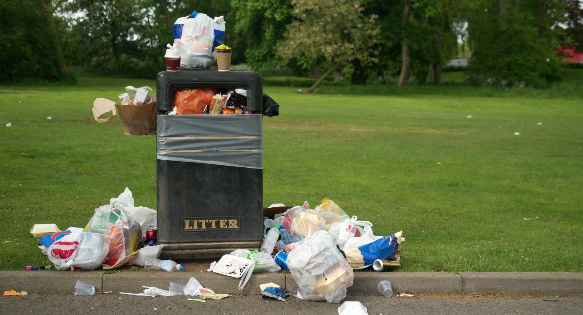 Overflowing litter bin