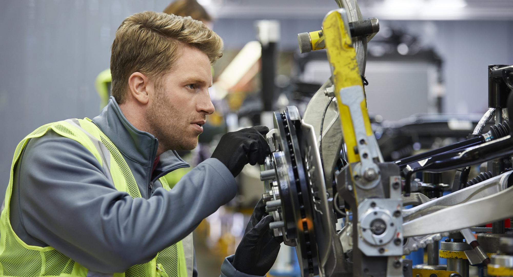 Man working on a car manufacturing plant