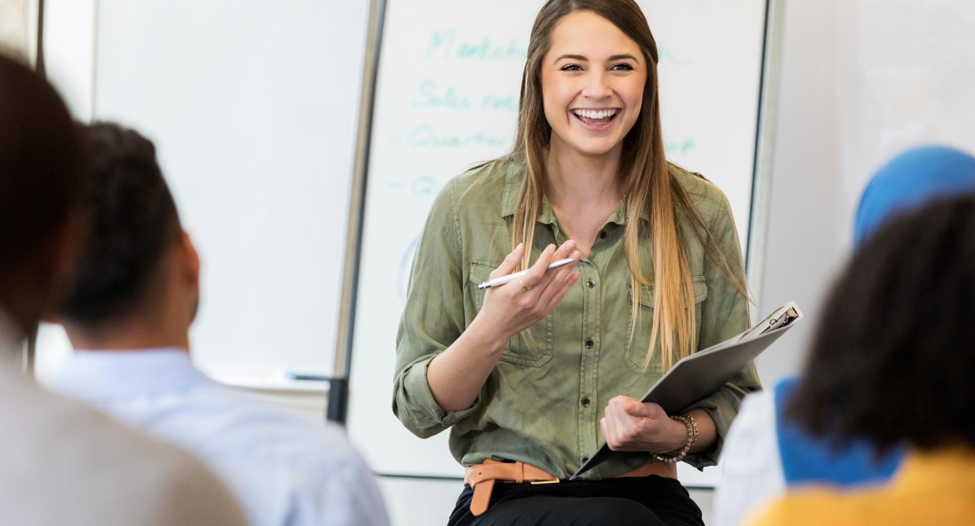 Young woman presenting to a room