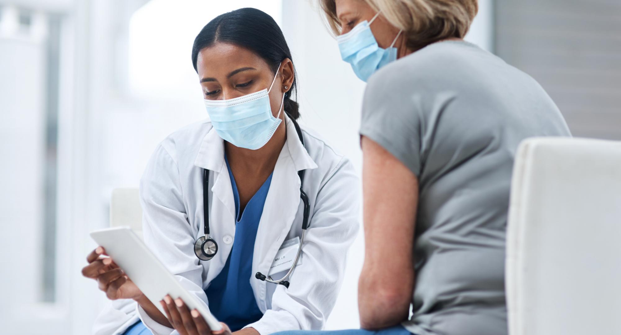 Health worker with woman