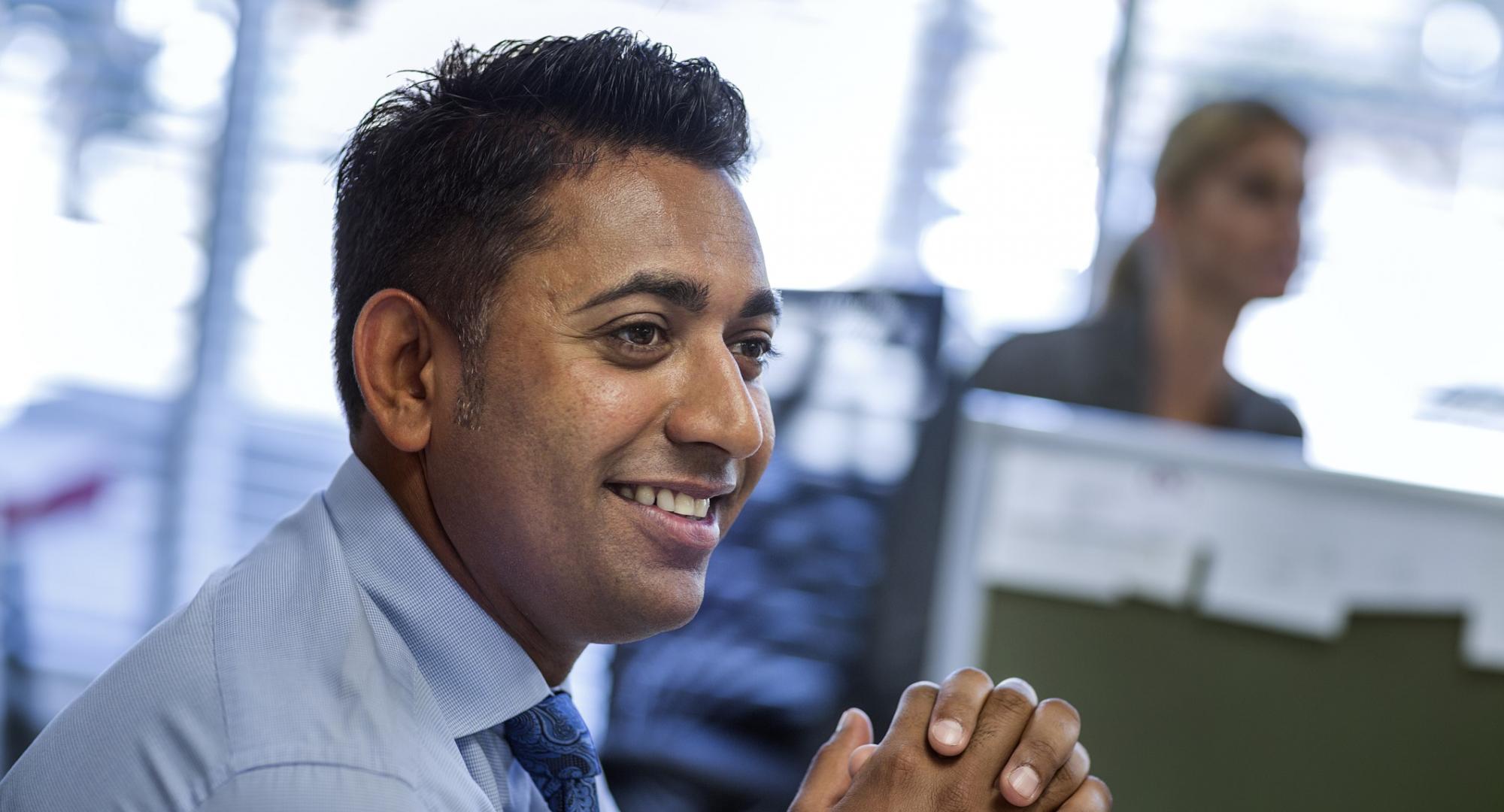 UK office worker smiling