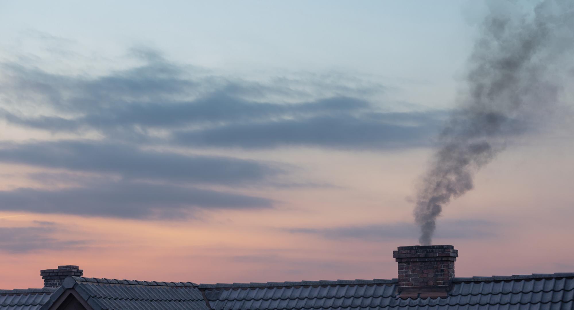 House chimney giving out smoke