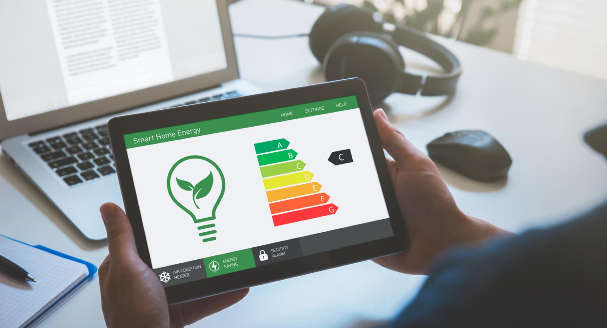 A tablet showing energy levels in a home