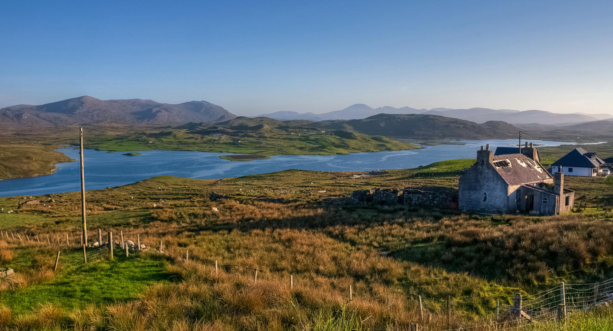 Rural Scottish village with lake in the background