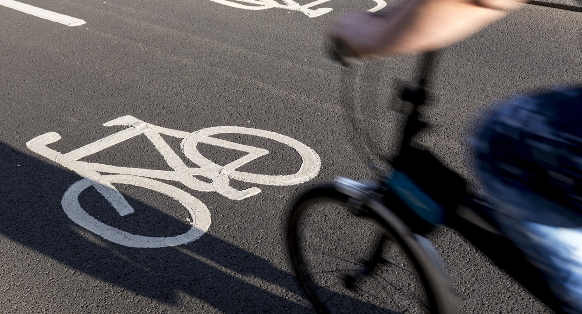 image of someone riding on a cycle path
