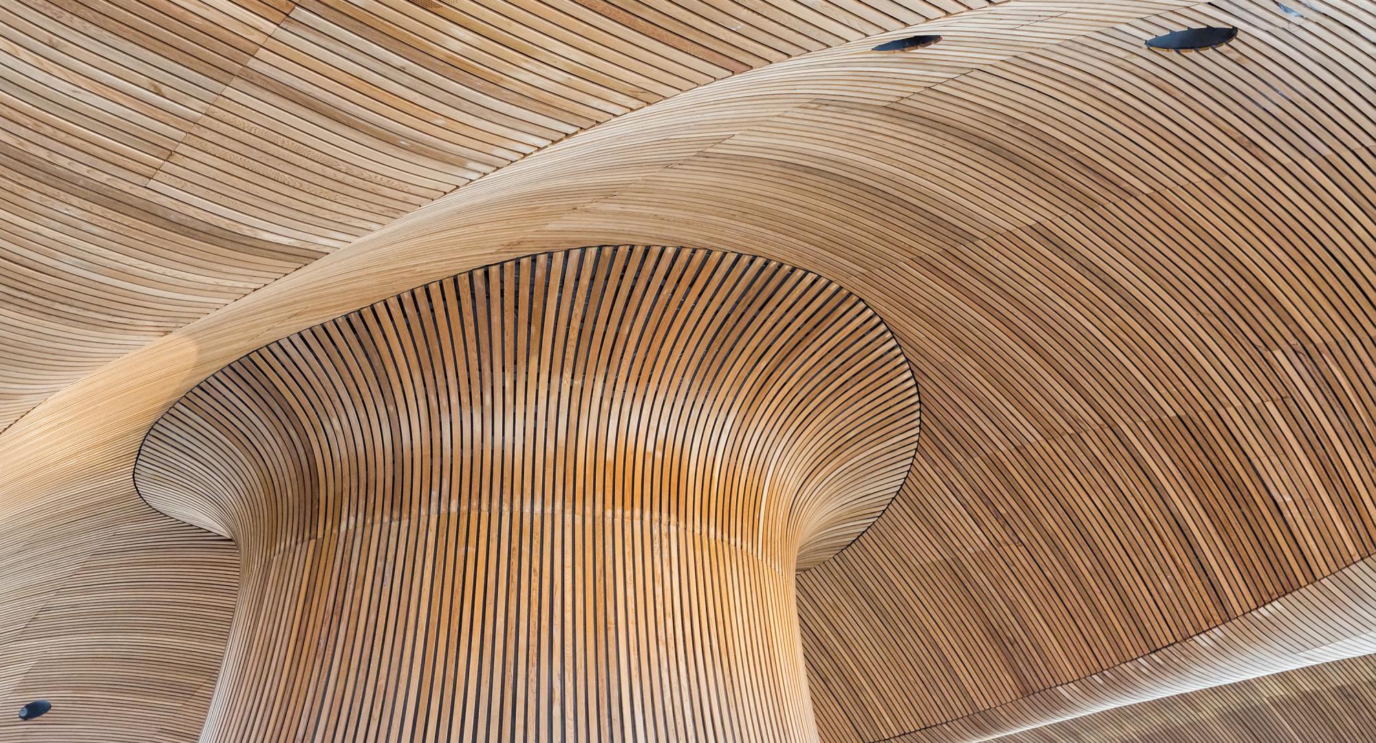 Wooden pillar in large room