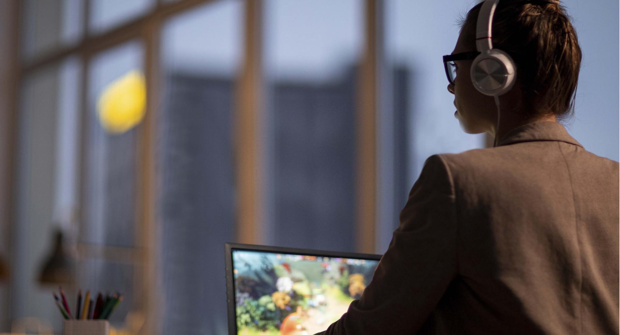 Woman using Acer computer 