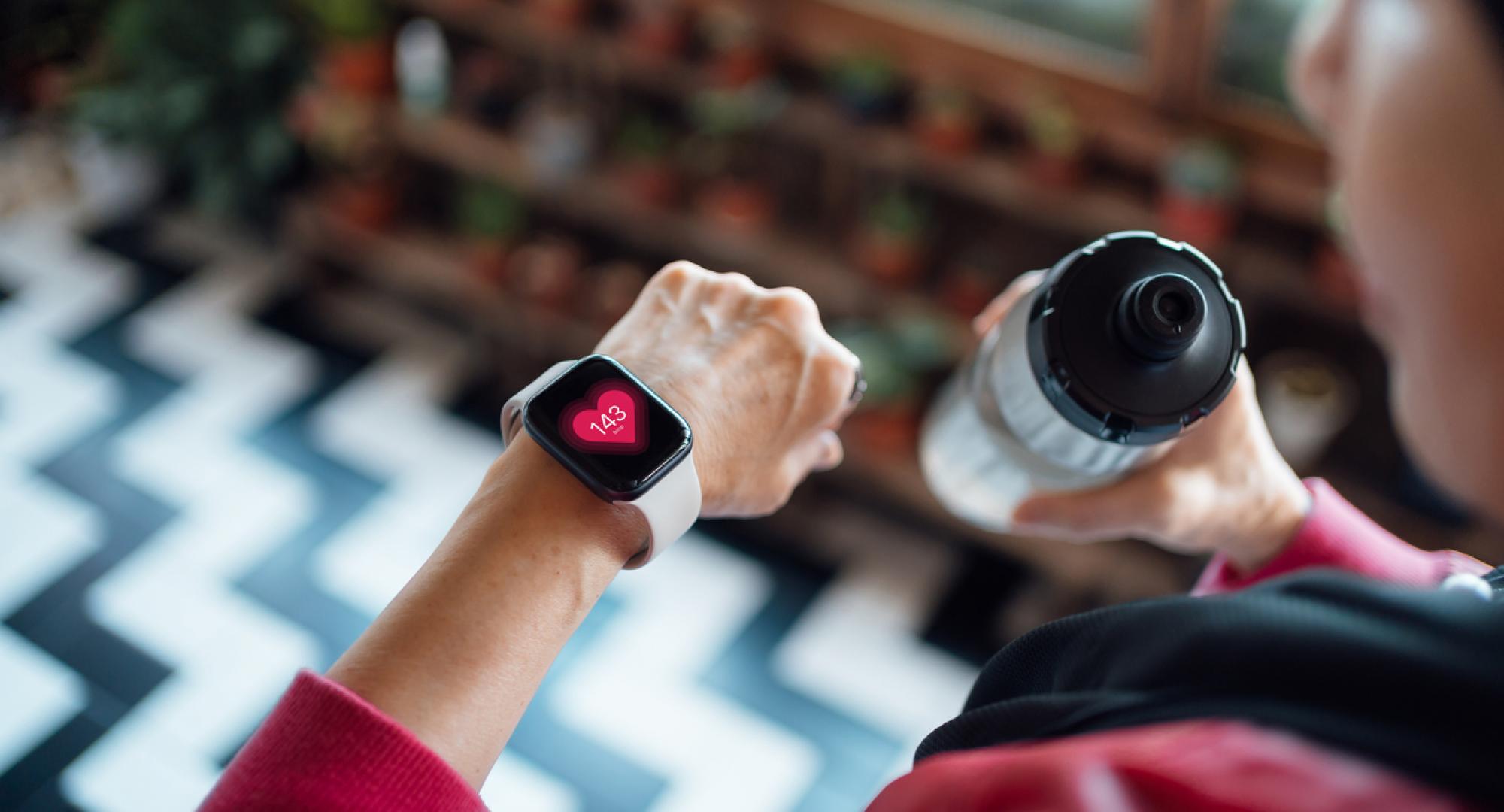 Woman looking at a smart watch