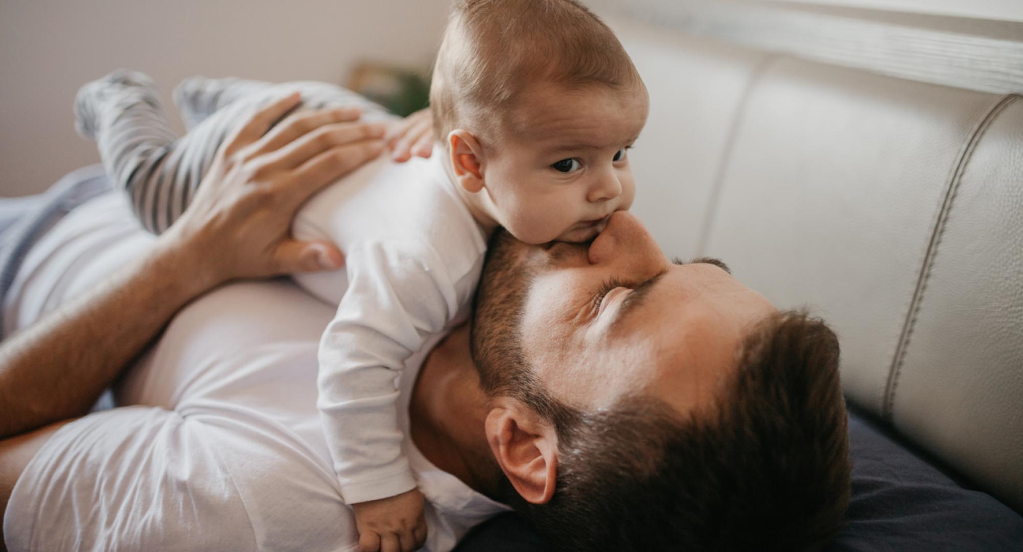 Baby playing with dad