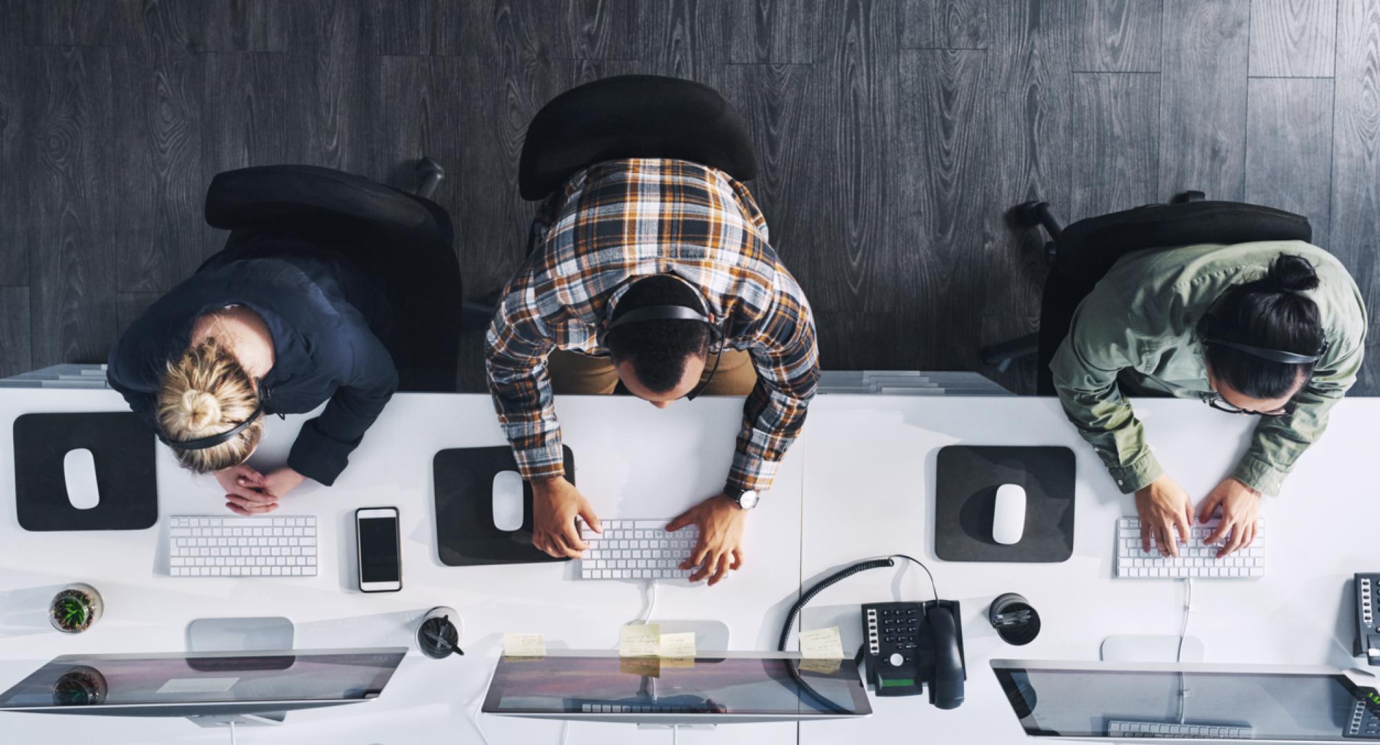 High angle shot of a group of people working in an office