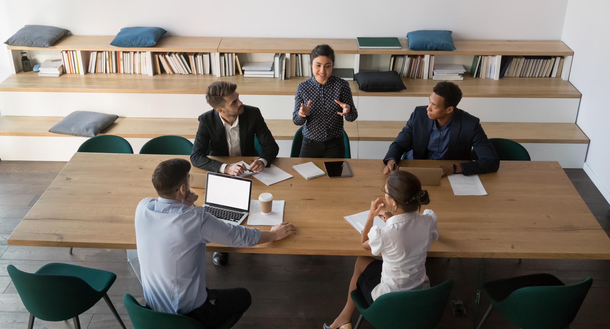 Group of people around a desk