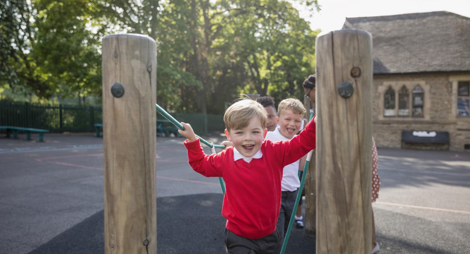 Children playing on playground at school