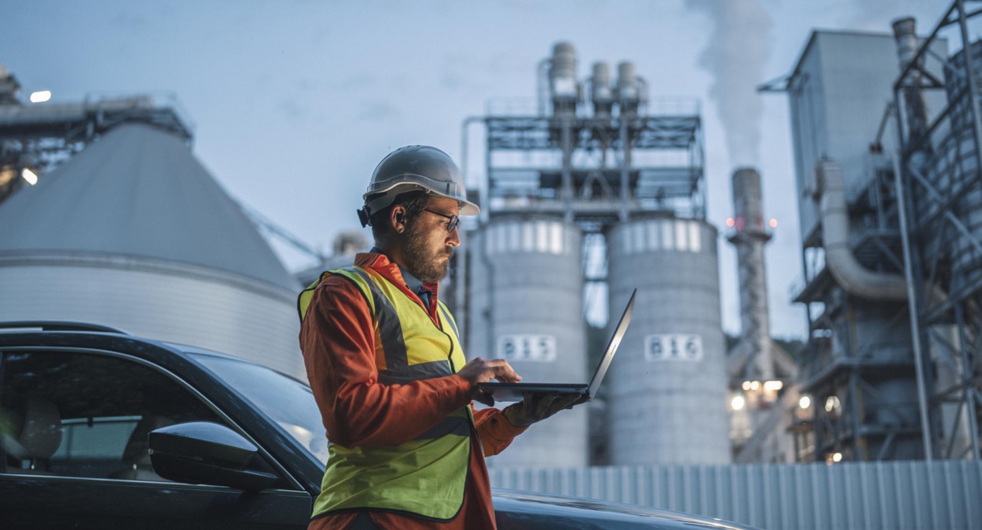 Man in front of power station